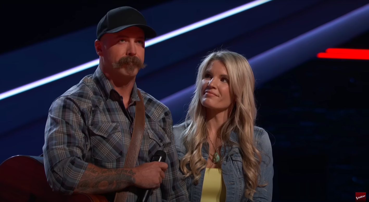 Jacob Ryan Gustafson standing with his now fiancée Jennifer Brown. | Source: YouTube/The Voice