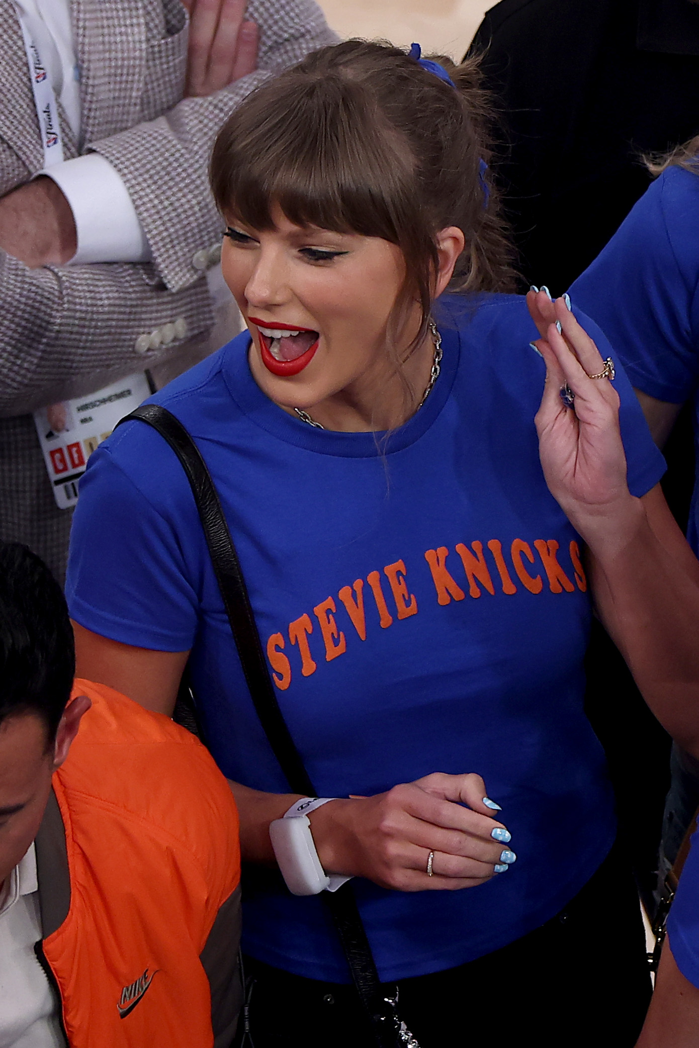 Taylor Swift reacts before Game 4 of the 2026 NBA Finals at Madison Square Garden on June 10, 2026. Her conversation with Tom Cruise months later left viewers filling in the blanks with theories of their own. | Source: Getty Images