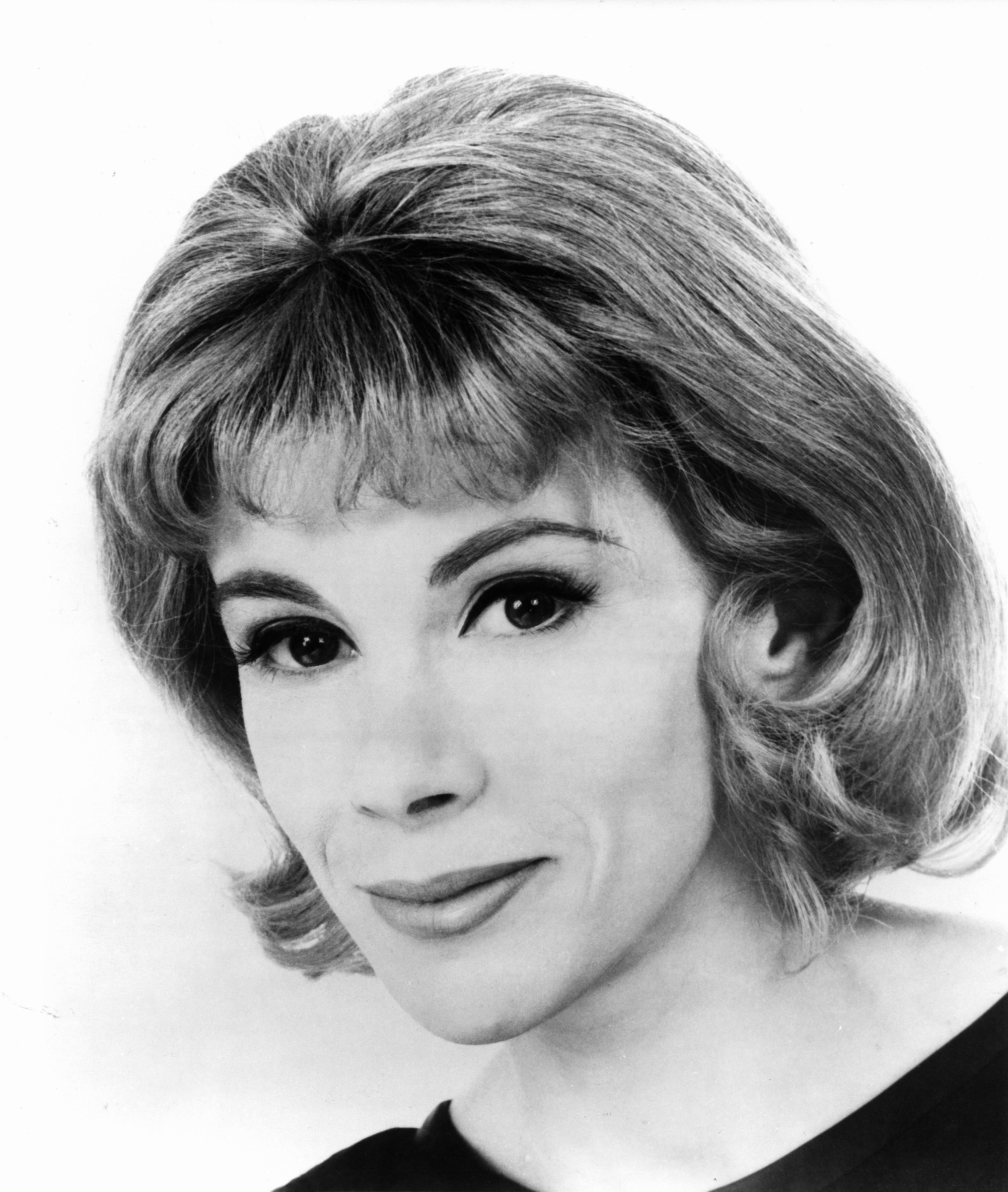 Joan Rivers poses for a portrait in New York City circa 1967, two years after the earlier image captured the comedian near the start of her career. | Source: Getty Images