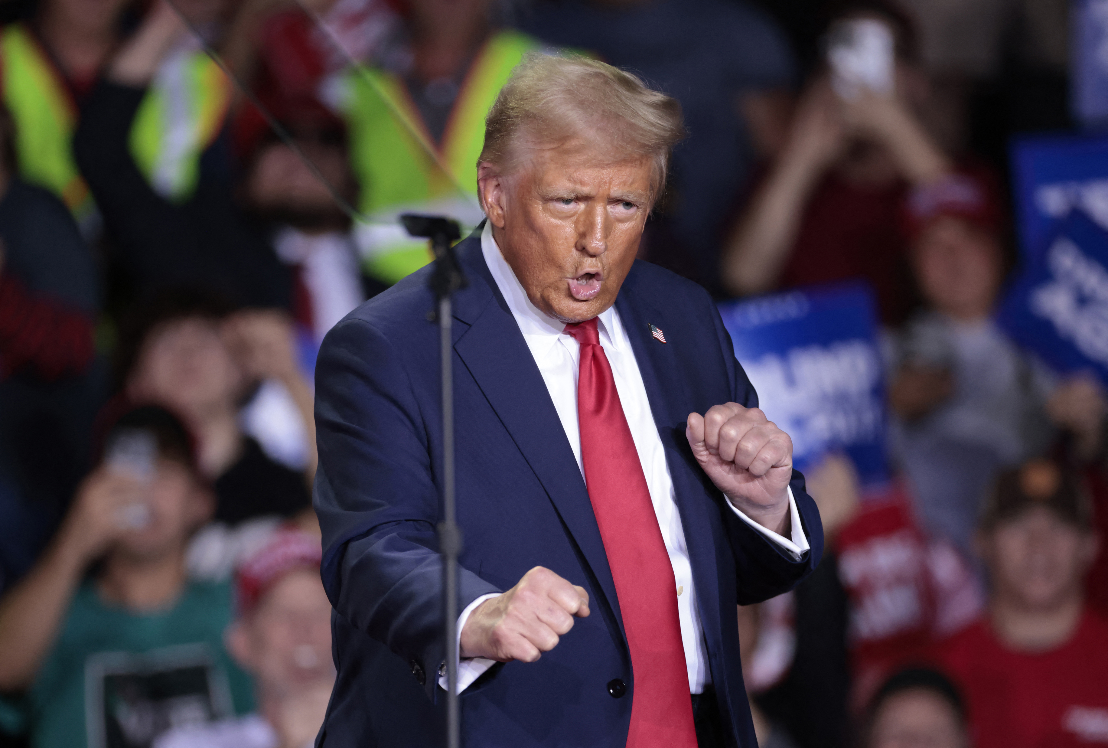 Donald Trump dances as he arrives to speak during his final campaign rally at the Van Andel Arena in Grand Rapids, Michigan, on November 5, 2024 | Source: Getty Images