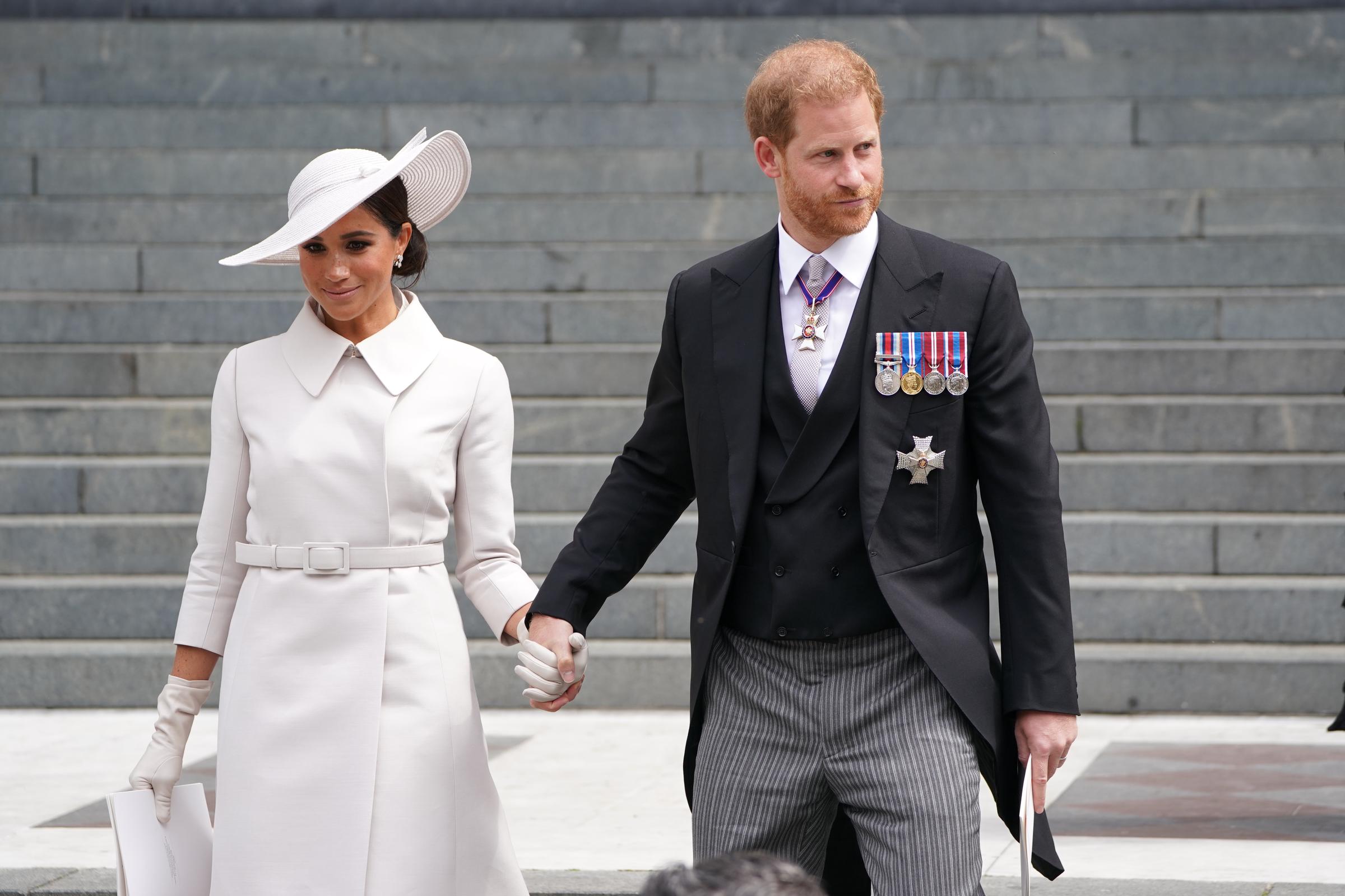 The Duke and Duchess of Sussex didn't join the rest of the royal family on the balcony for the main flypast during the festivities. In this photo, they were seen leaving after the National Service of Thanksgiving to Celebrate the Platinum Jubilee of Her Majesty The Queen at St Paul's Cathedral on June 3, 2022, in London, England. | Source: Getty Images