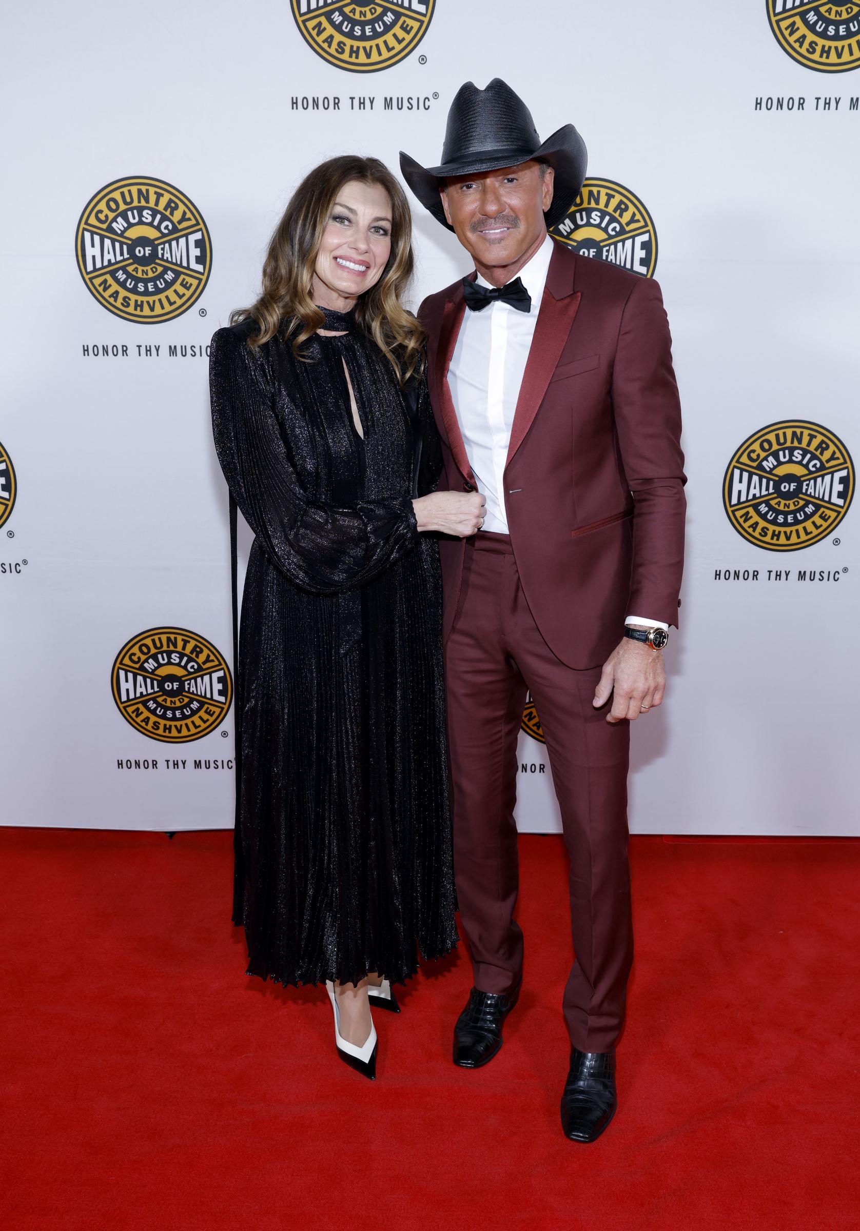 Tim McGraw poses with his wife, Faith Hill, on the red carpet at the Country Music Hall of Fame and Museum’s 2026 Medallion Ceremony in Nashville, Tennessee, on October 18, 2026. | Source: Getty Images