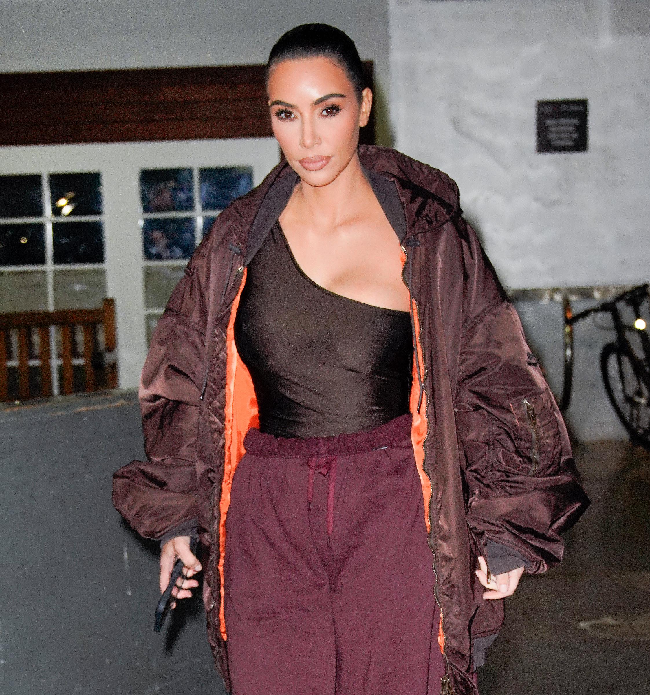 Kim Kardashian, 41, departed from her hotel on November 3, 2021, in New York City. Her face showed extreme smoothness and tautness across the forehead and cheeks, with no visible expression lines around her eyes or mouth.