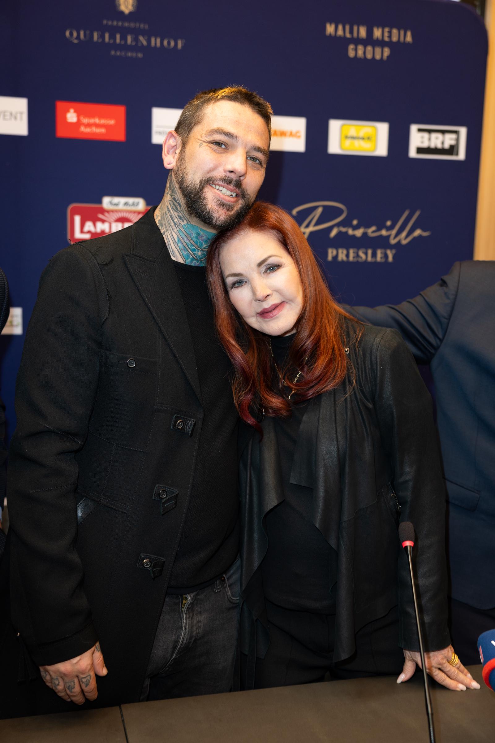 Navarone, 39, is the lead vocalist and guitarist of the synth-rock band Them Guns, which he formed after returning to Los Angeles in 2012. His distinctive neck tattoos sparked their own online discussion, with curious viewers questioning their design. | Source: Getty Images