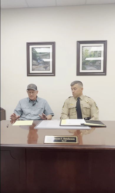 Michael Hatcher giving his statement next to Sheriff Bryan Hutcheson in a video, dated August 7, 2025 | Source: Facebook/Rockingham County Sheriff's Office - VA