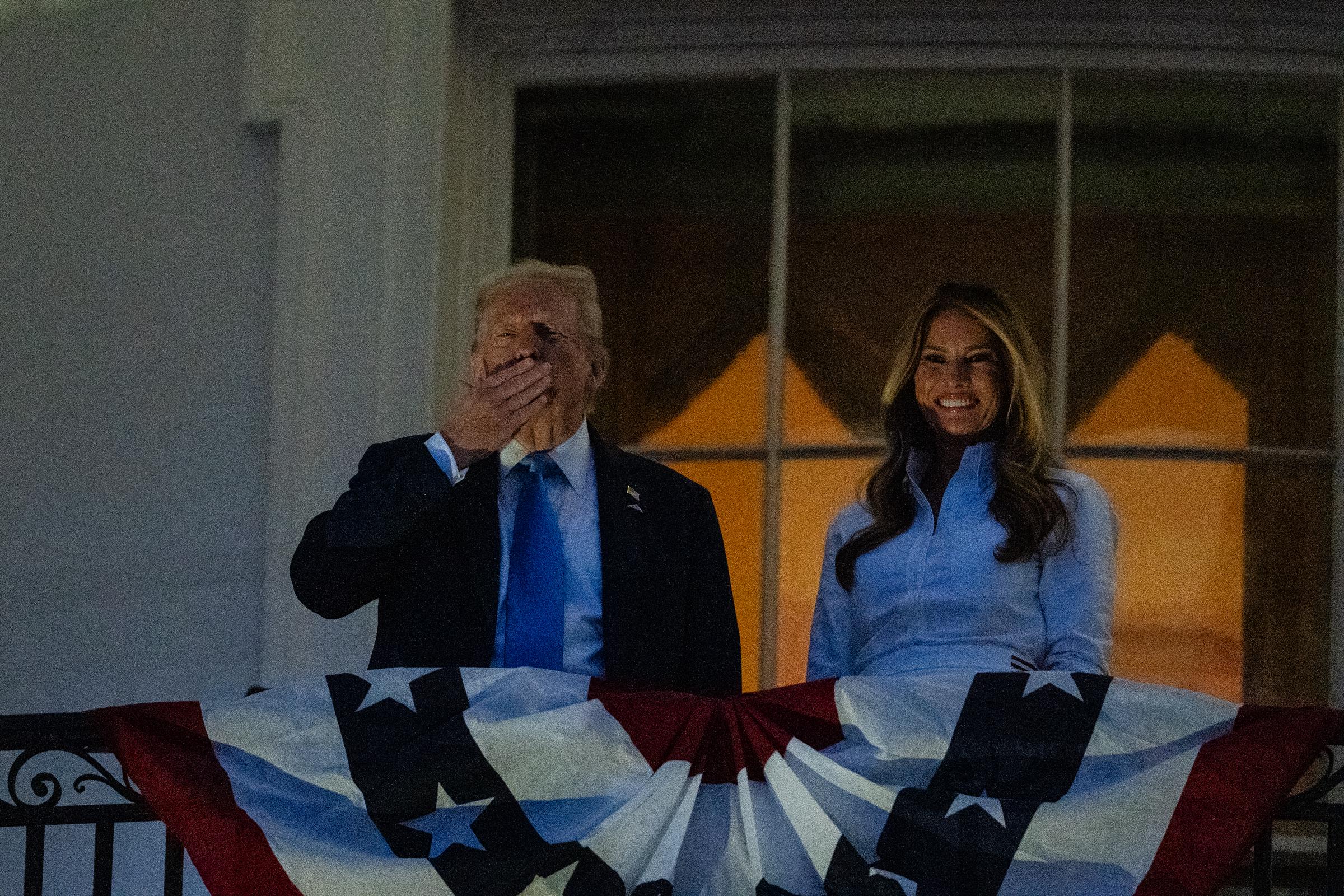 Donald Trump blows a kiss to the crowd as he and First Lady Melania Trump watch fireworks during a Fourth of July celebration at the White House on July 4, 2025 in Washington, DC. | Source: Getty Images