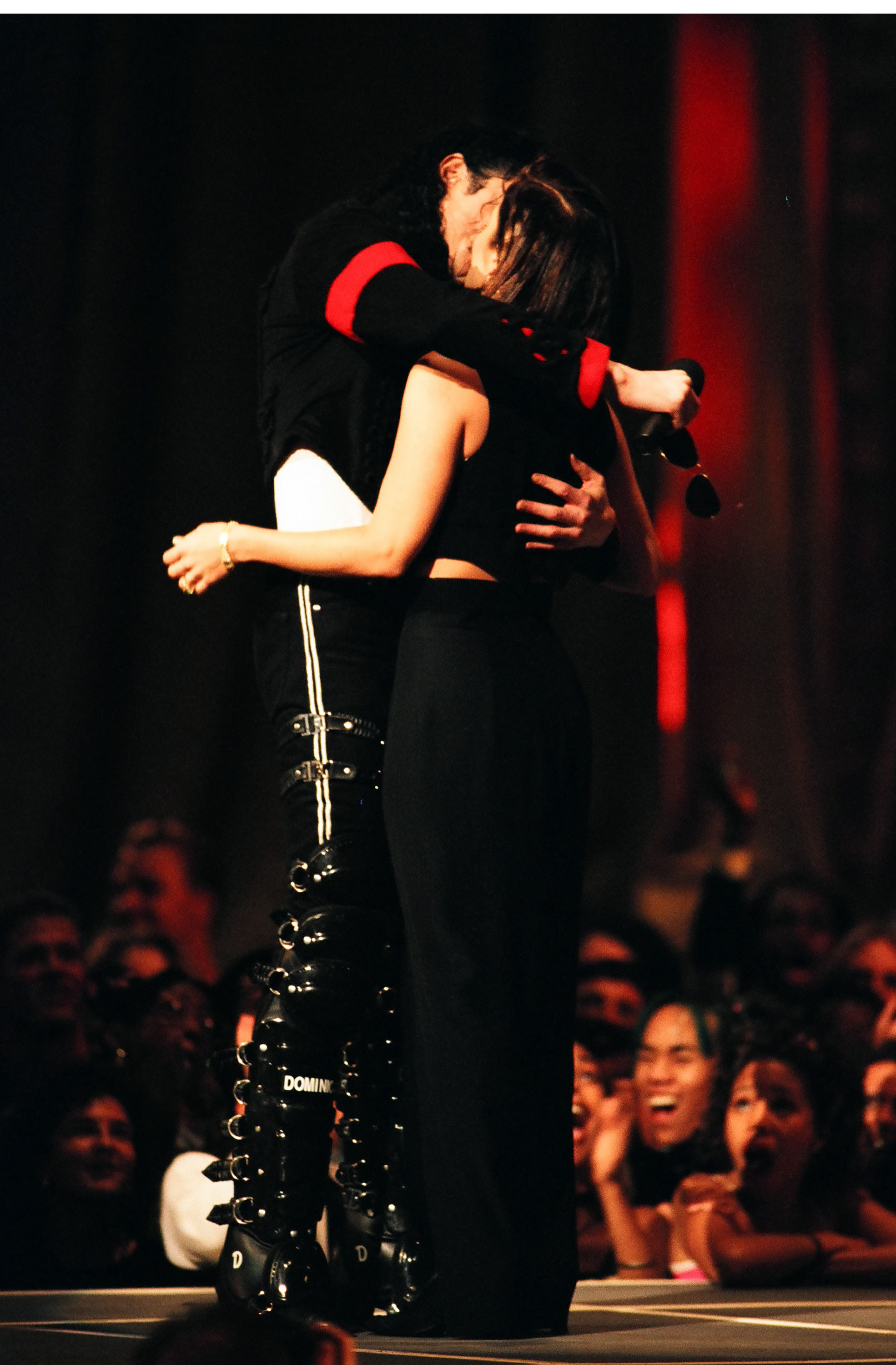 Michael Jackson and Lisa Marie Presley share a passionate kiss on stage at the VMAs, one of the ceremony's most talked-about moments that instantly became pop culture history.