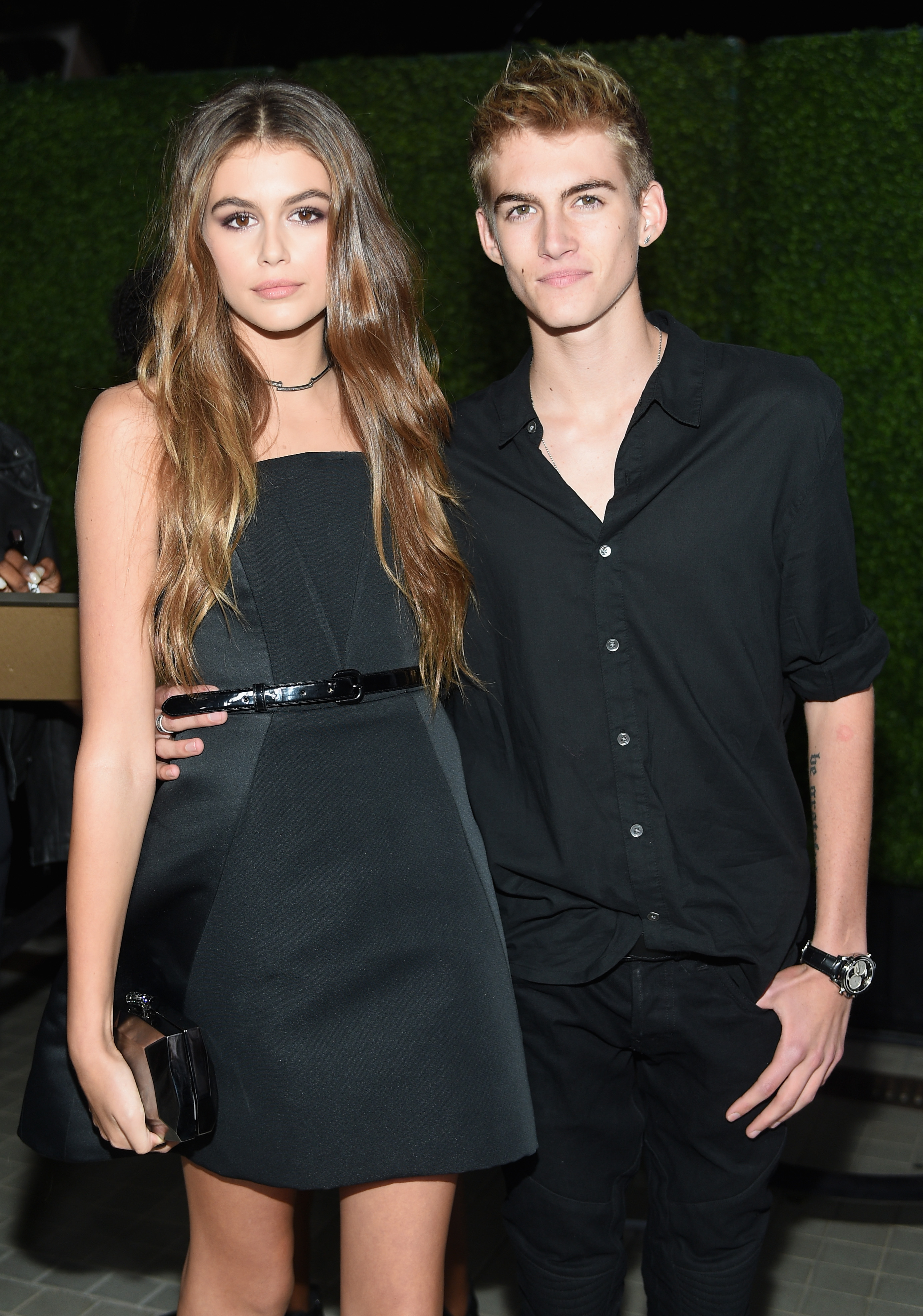 Kaia Gerber and Presley Gerber coordinated in chic all-black ensembles while attending the Teen Vogue celebration for the 13th Annual Young Hollywood Issue with Emporio Armani on October 2, 2015, in Beverly Hills, California. | Source: Getty Images