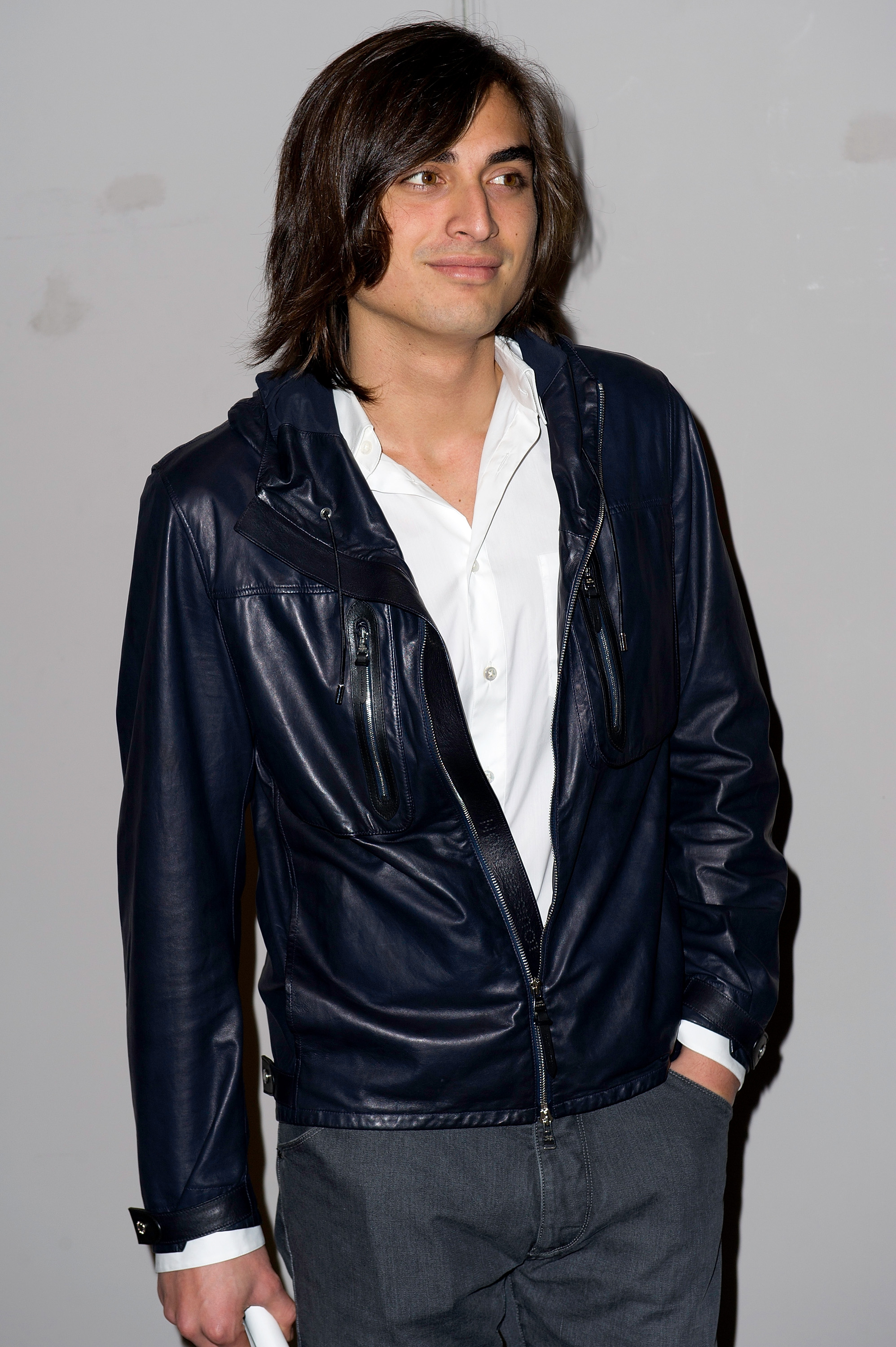 Tuki Brando attends the "L'Uomo Vogue" Covers Exhibition and auction at Sotheby's during Paris Fashion Week Menswear in France on January 19, 2012. His appearance carried added significance, as the magazine had helped launch his modeling career after Bruce Weber photographed him for one of its covers.