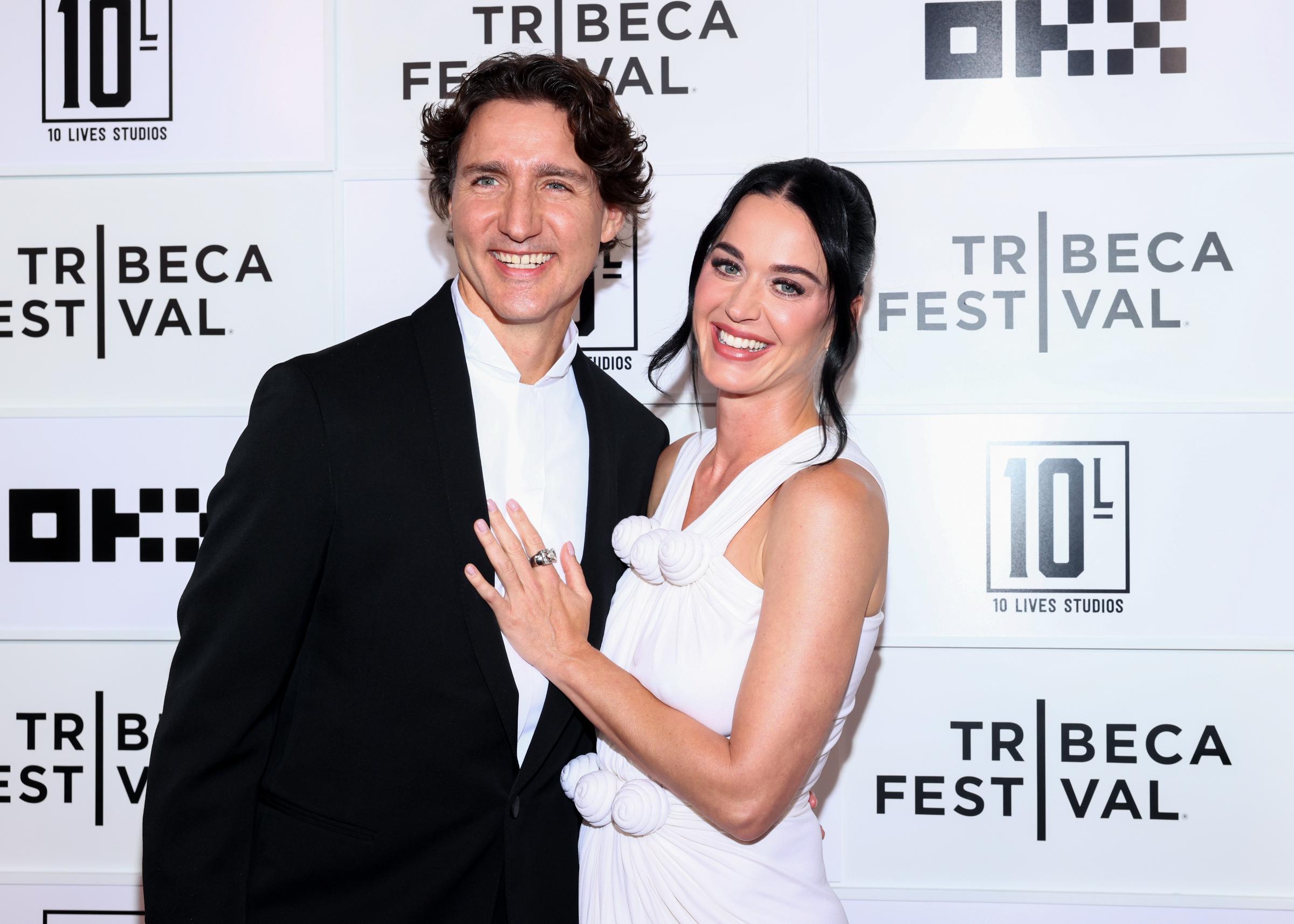 Perry rested her hand on Trudeau's chest as the couple smiled for photographers during a major public appearance together. They attended the Tribeca Festival premiere of her concert film in New York City on June 8, 2026. | Source: Getty Images