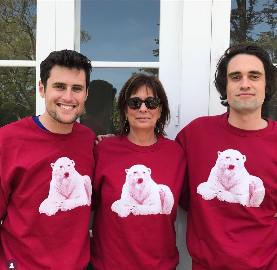 Michele and her sons Jake and Nick Reiner are wearing matching red sweatshirts featuring a white polar bear graphic on the front, from a post dated April 4, 2018. | Source: Instagram/michelereiner
