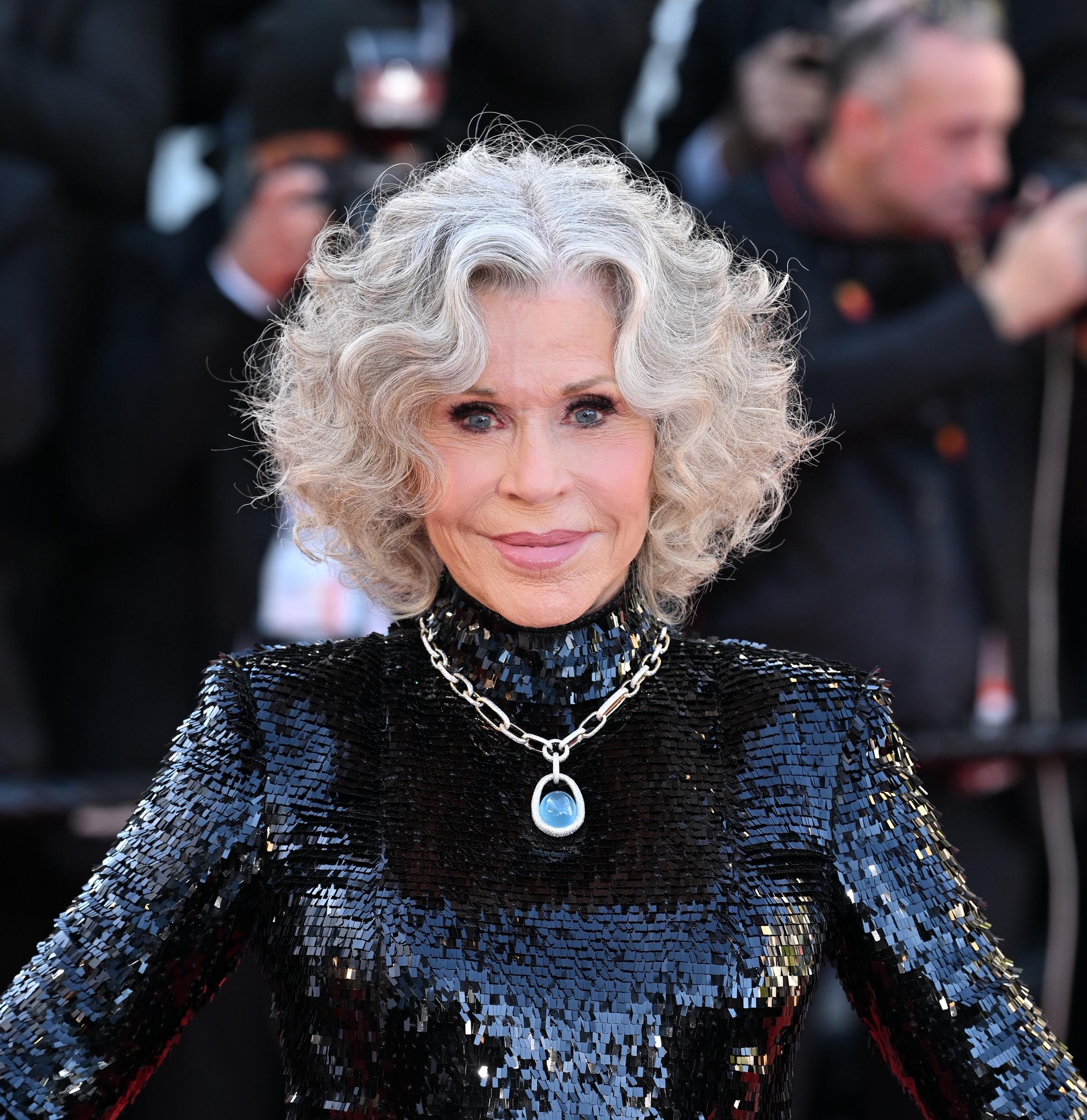 Jane Fonda smiles for photographers during a Cannes red carpet event | Source: Getty Images
