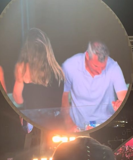 Andy Byron and Kristin Cabot hide their faces from the kiss cam at a Coldplay concert in Boston, from a video post dated July 17, 2025 | Source: TikTok/instaagraace