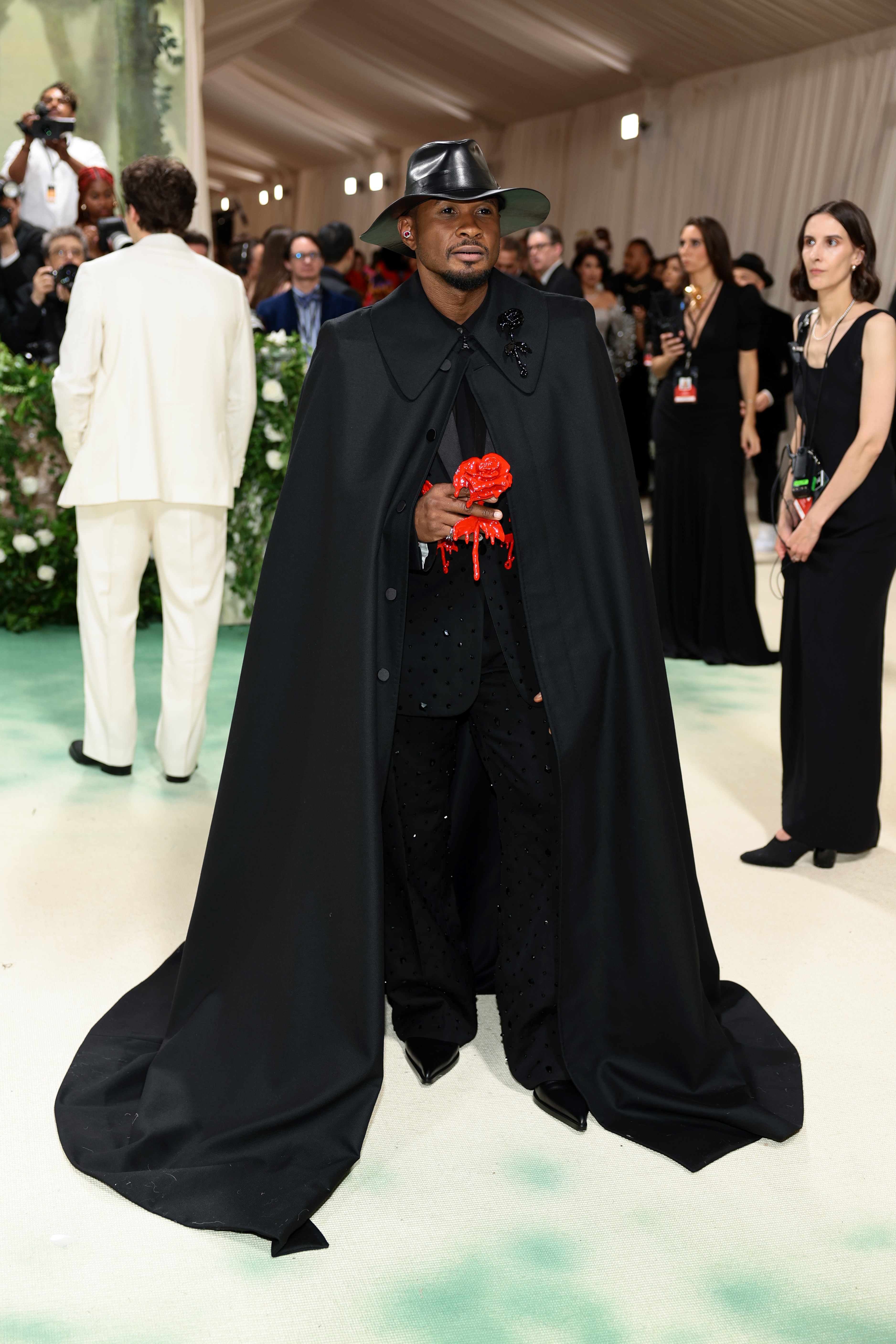 Usher attends The Met Gala Celebrating "Sleeping Beauties: Reawakening Fashion" at The Metropolitan Museum of Art on May 6, 2024, in New York City | Source: Getty Images