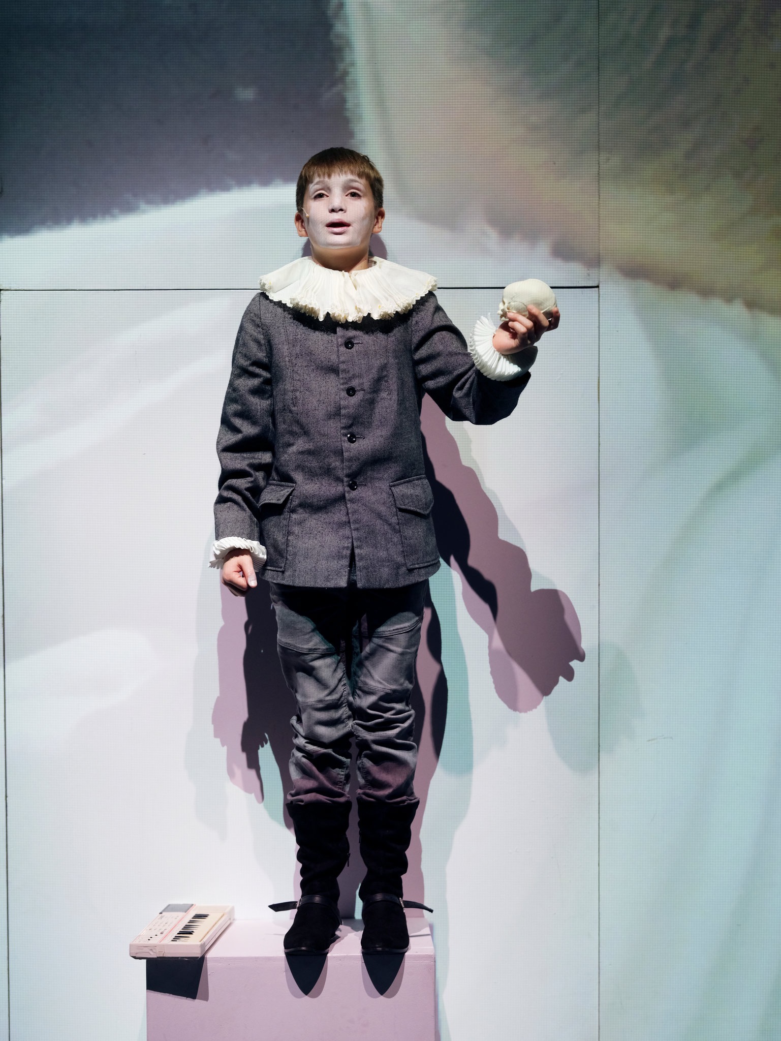 The stage may have looked sparse, but the role was anything but: Aran spent nearly an hour largely alone in front of an audience, playing a boy whose real-life story left historians with remarkably little to work from. | Source: Getty Images