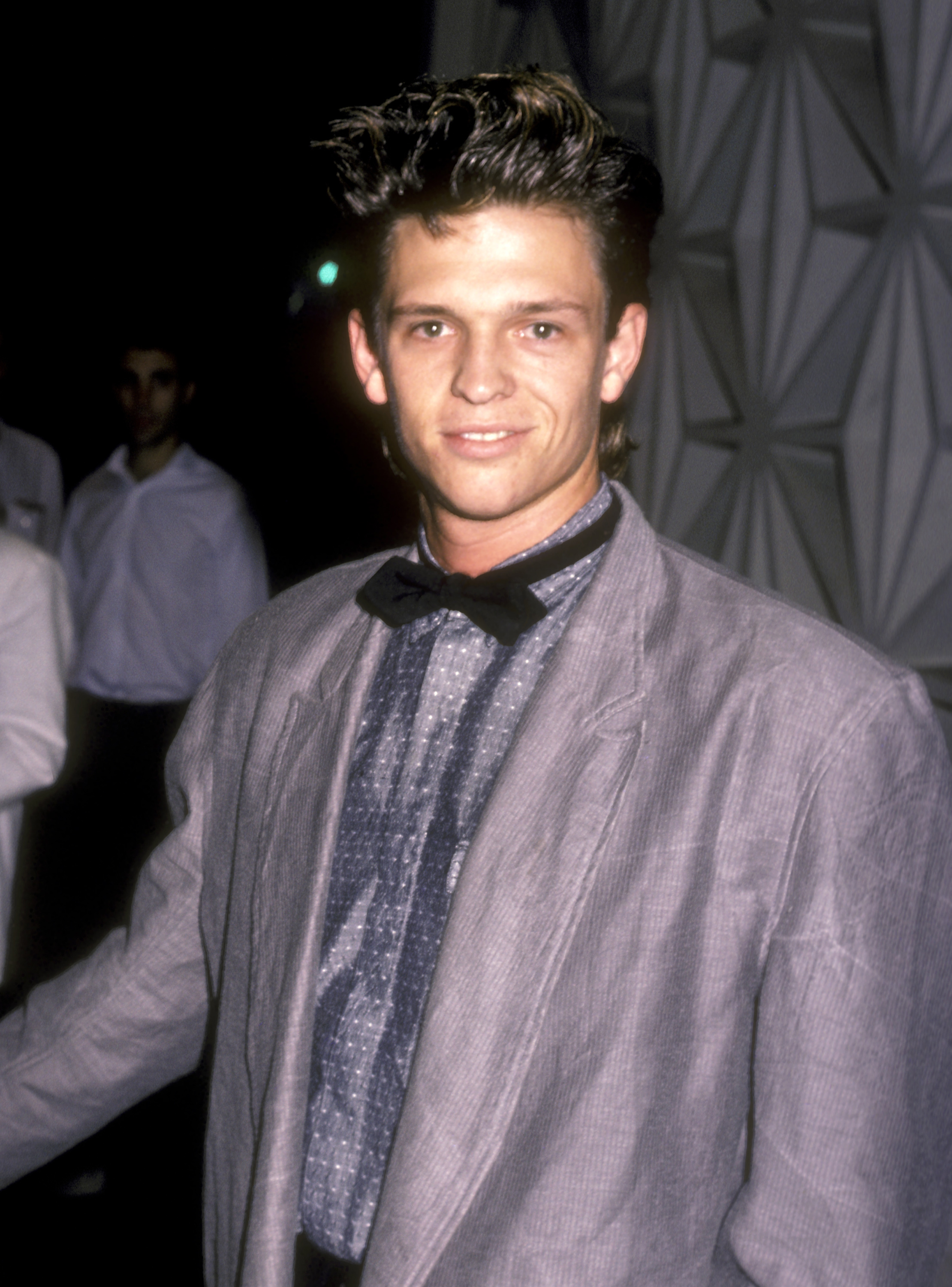 As the styles changed, Jimmy McNichol cut his hair and took on a rugged appearance. In this photo, he attended a film screening at the DGA Theatre on October 5, 1985, in West Hollywood, California. | Source: Getty Images