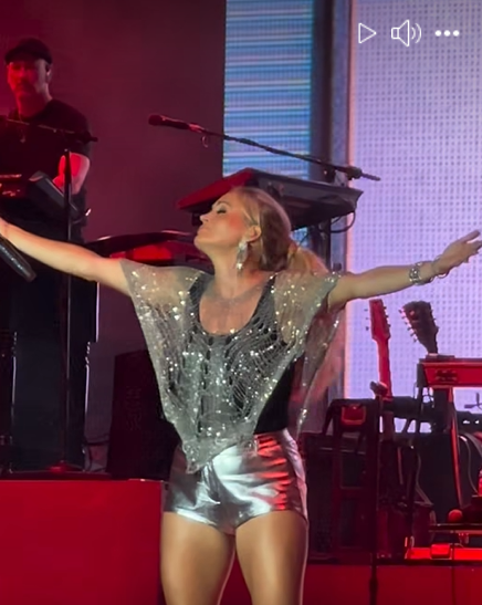 Carrie Underwood is captured in a dramatic pose, as seen from a video post dated November 30, 2025.| Source: Facebook/thecountrywire