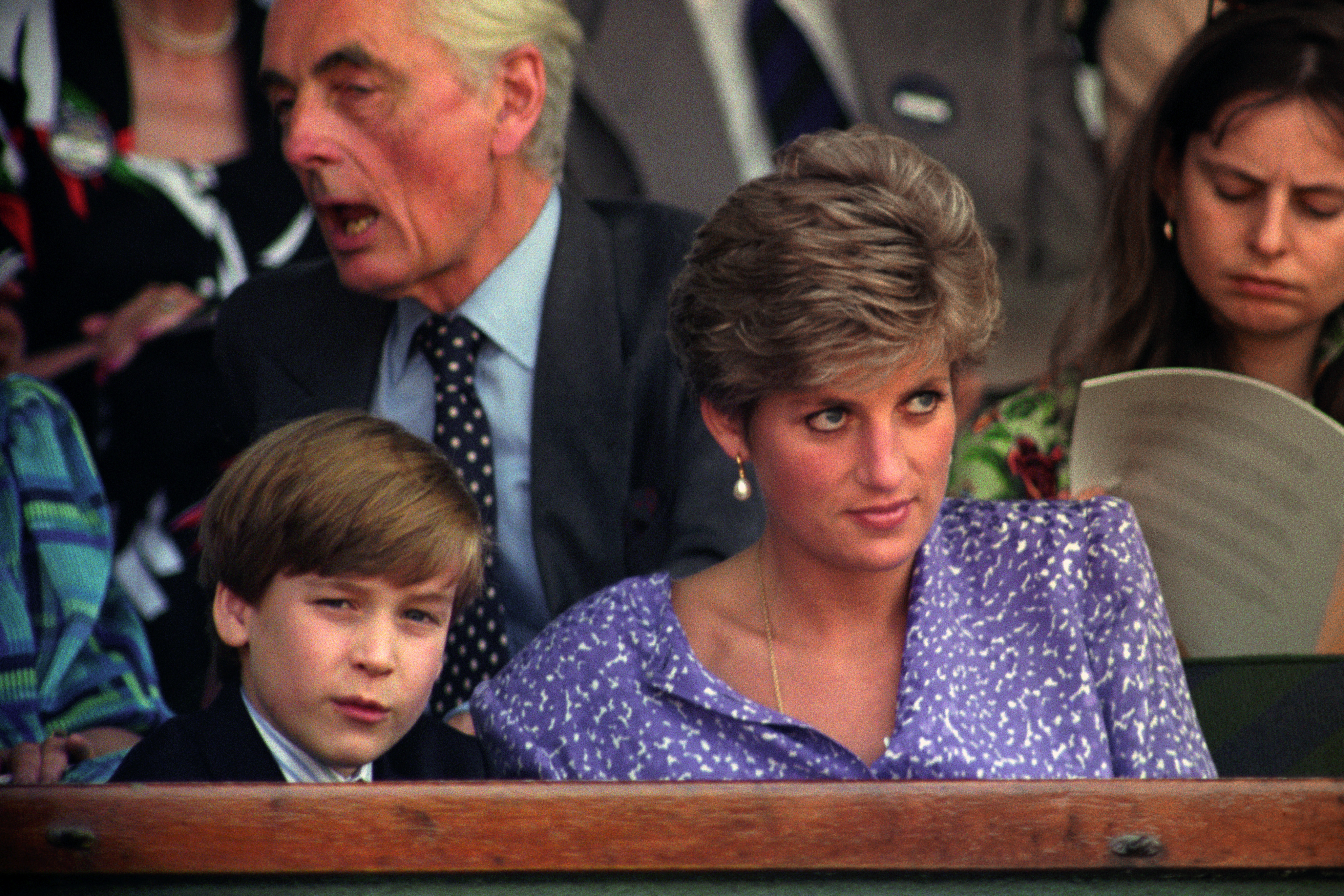 Like her future daughter-in-law, Diana, Princess of Wales loved tennis. In this photo, she watched the action from the Royal Box on Centre Court at Wimbledon with her son Prince William in London, England. | Source: Getty Images