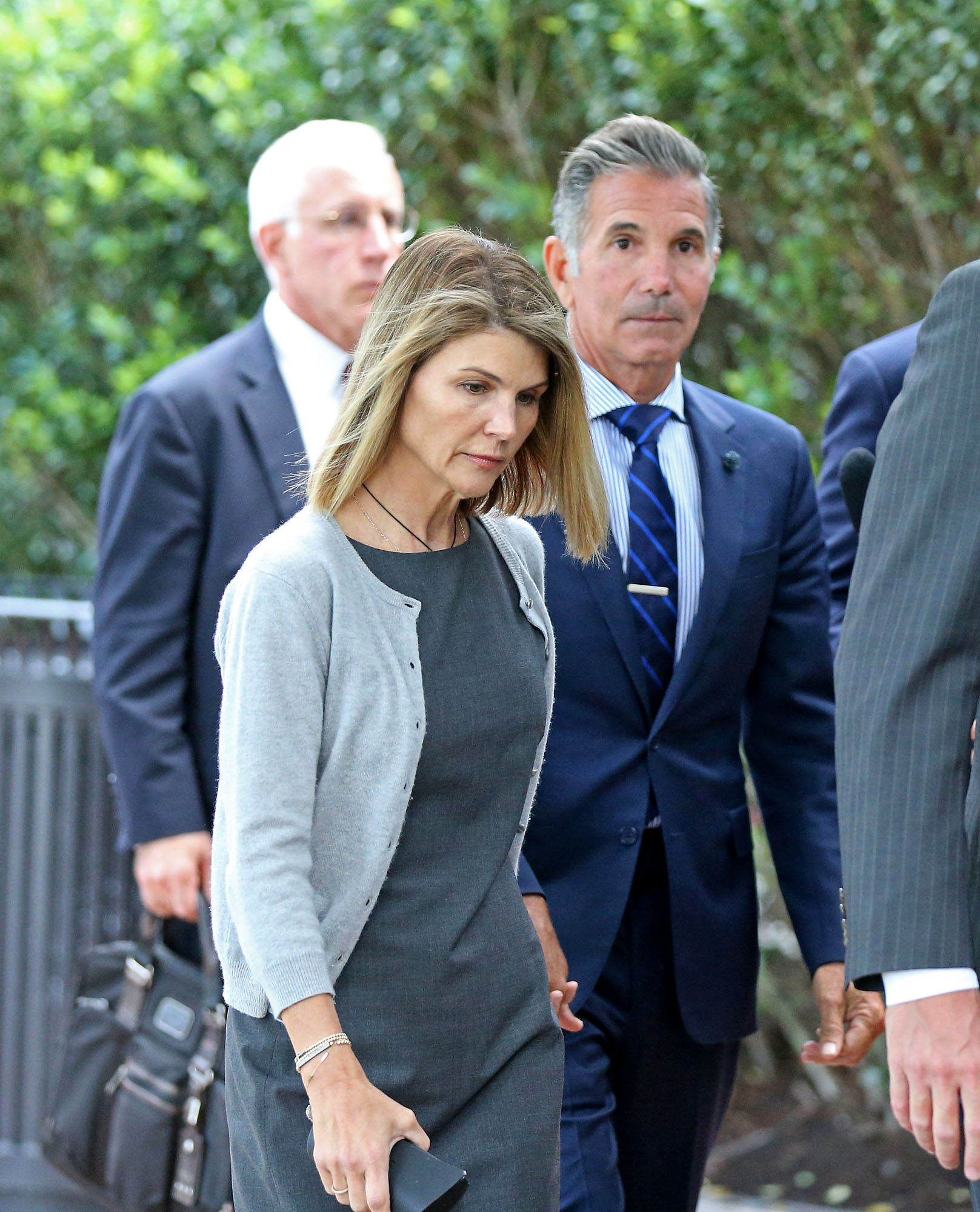 The couple weathered intense public scrutiny during the college admissions scandal, with both ultimately serving prison sentences. Years later, sources said their marriage had entered a difficult period before they began living separately. | Source: Getty Images