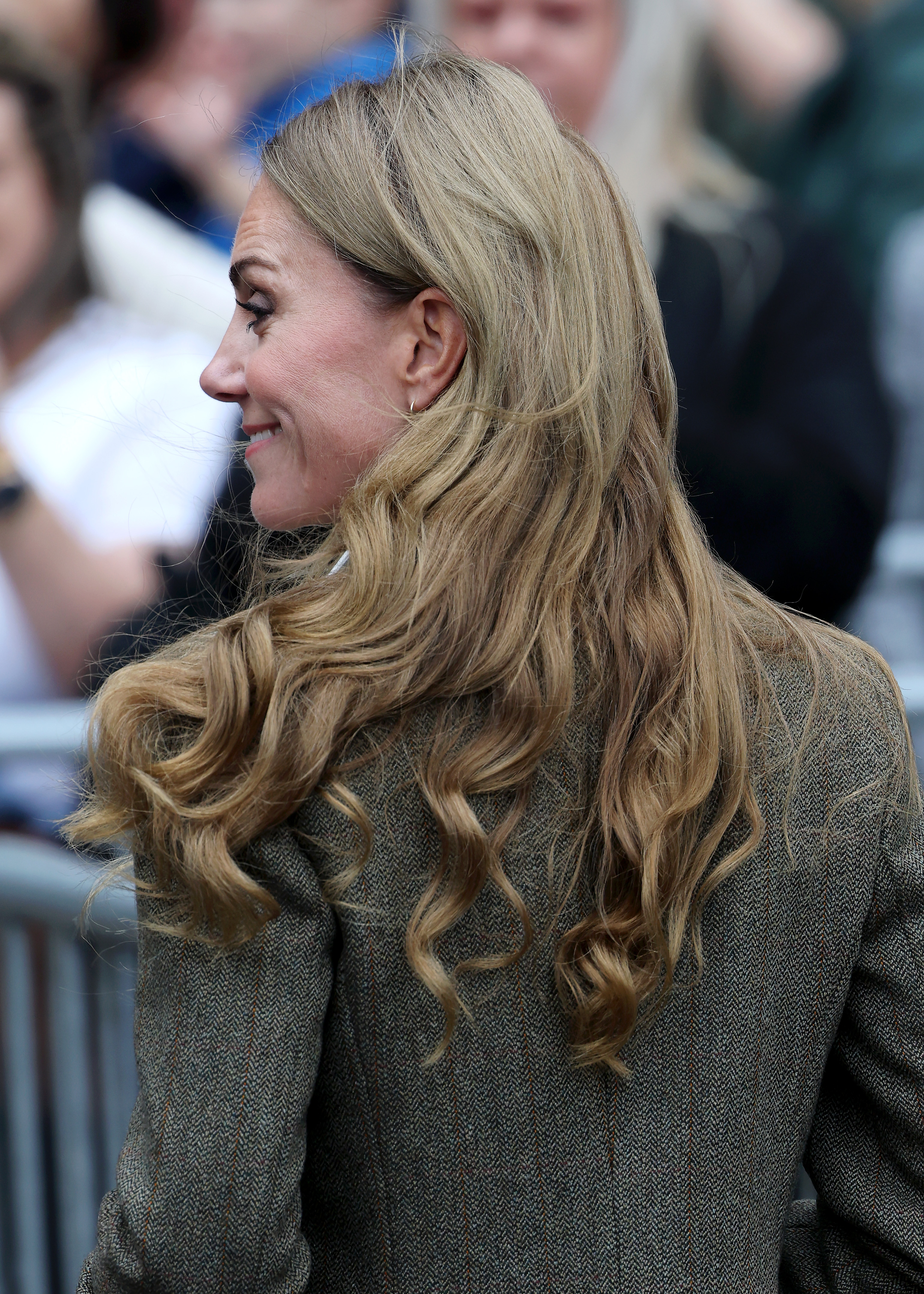 Princess Catherine showcases her newly lightened, wavy hairstyle during a visit to the Natural History Museum's renovated gardens in London on September 4, 2025 | Source: Getty Images