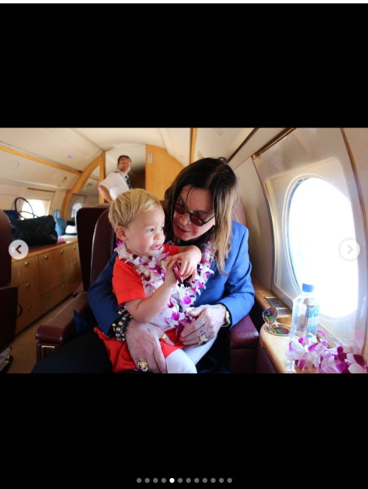 Ozzy Osbourne takes photo with his grandchild from inside a plane, from a post dated July 24, 2025 | Source: Instagram/lisastelly