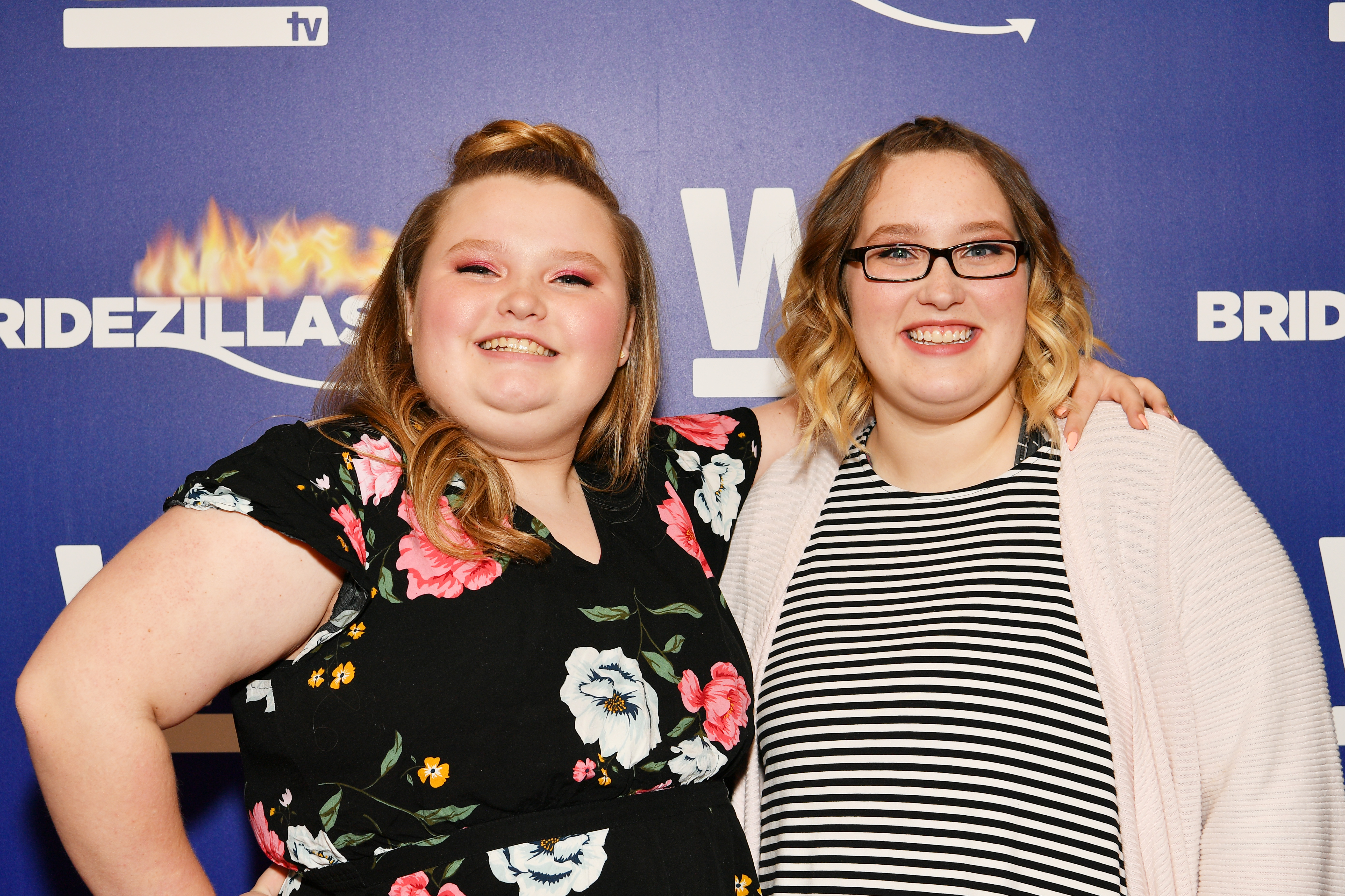 Alana “Honey Boo Boo” Thompson and her sister Lauryn “Pumpkin” Shannon pose together at WE tv’s Bridezillas premiere event in New York City, years before Pumpkin’s engagement announcement. | Source: Getty Images
