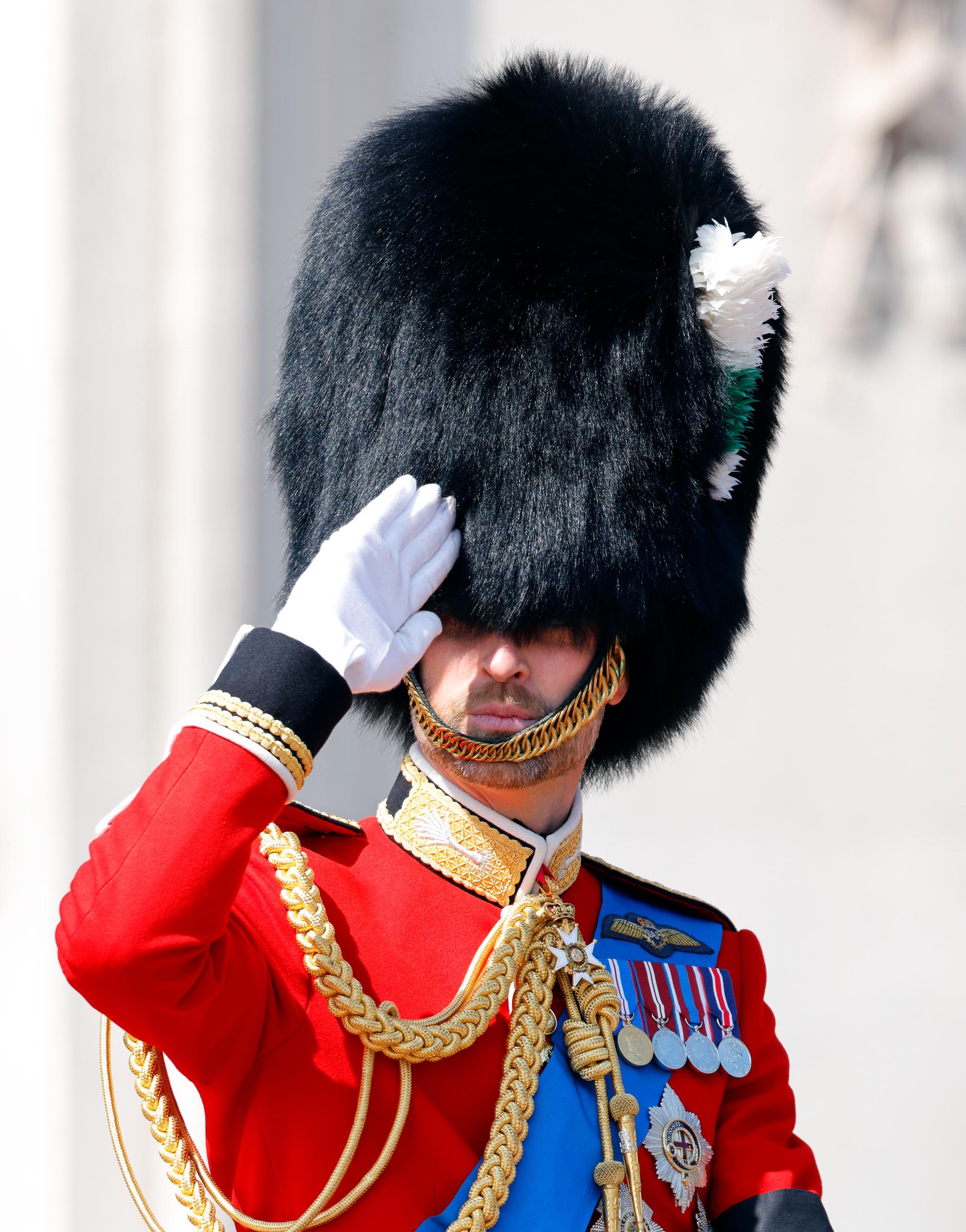 Prince William salutes as he departs Buckingham Palace on horseback on June 14, 2025 | Source: Getty Images