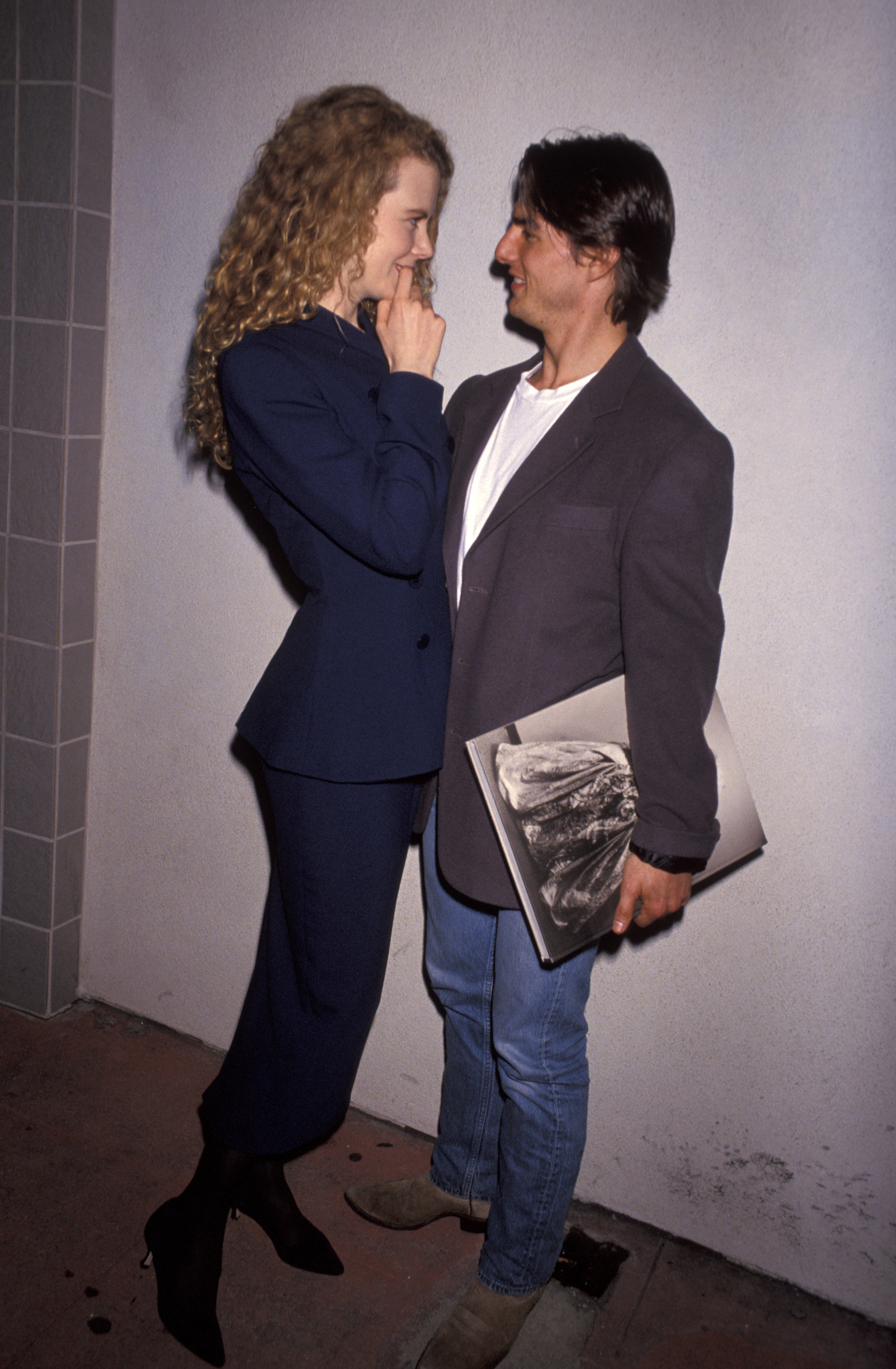 Nicole Kidman and Tom Cruise attend the opening of the Herb Ritts exhibition at the Fahey/Klein Gallery in West Hollywood, California. At the time, Kidman was building a life with Cruise while facing concerns that becoming the Hollywood star’s wife could affect her own career — a warning she later recalled having little interest in heeding. | Source: Getty Images