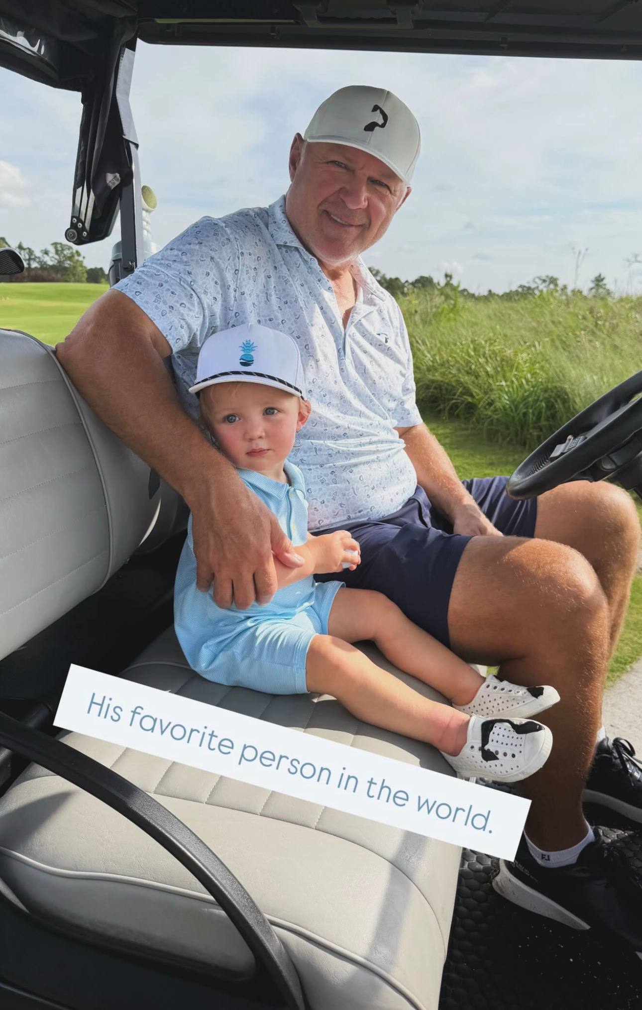 Claude Lemieux enjoys a quiet moment with a young child in a golf cart in a photo shared by Brookie. | Source: Instagram Story/brookiemon