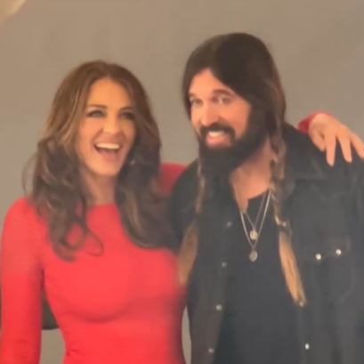 Elizabeth Hurley and Billy Ray Cyrus share a laugh during a photo shoot, posted in November 2022 | Source: Instagram/elizabethhurley1