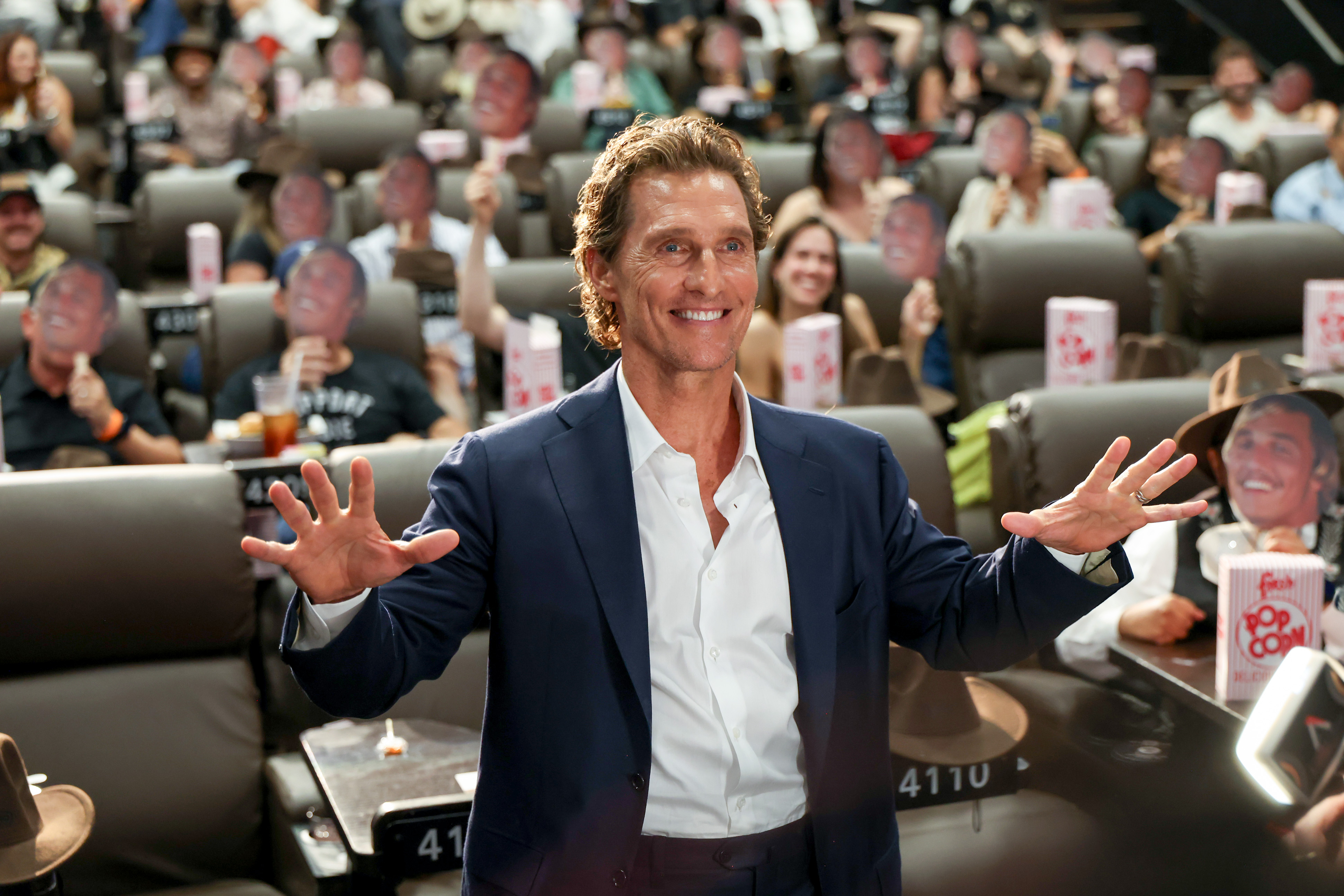 Matthew McConaughey greets the crowd during the dedication ceremony for Matthew McConaughey Cinema and a special screening of The Rivals of Amziah King in Austin, Texas, on Aug. 10, 2026. | Source: Getty Images