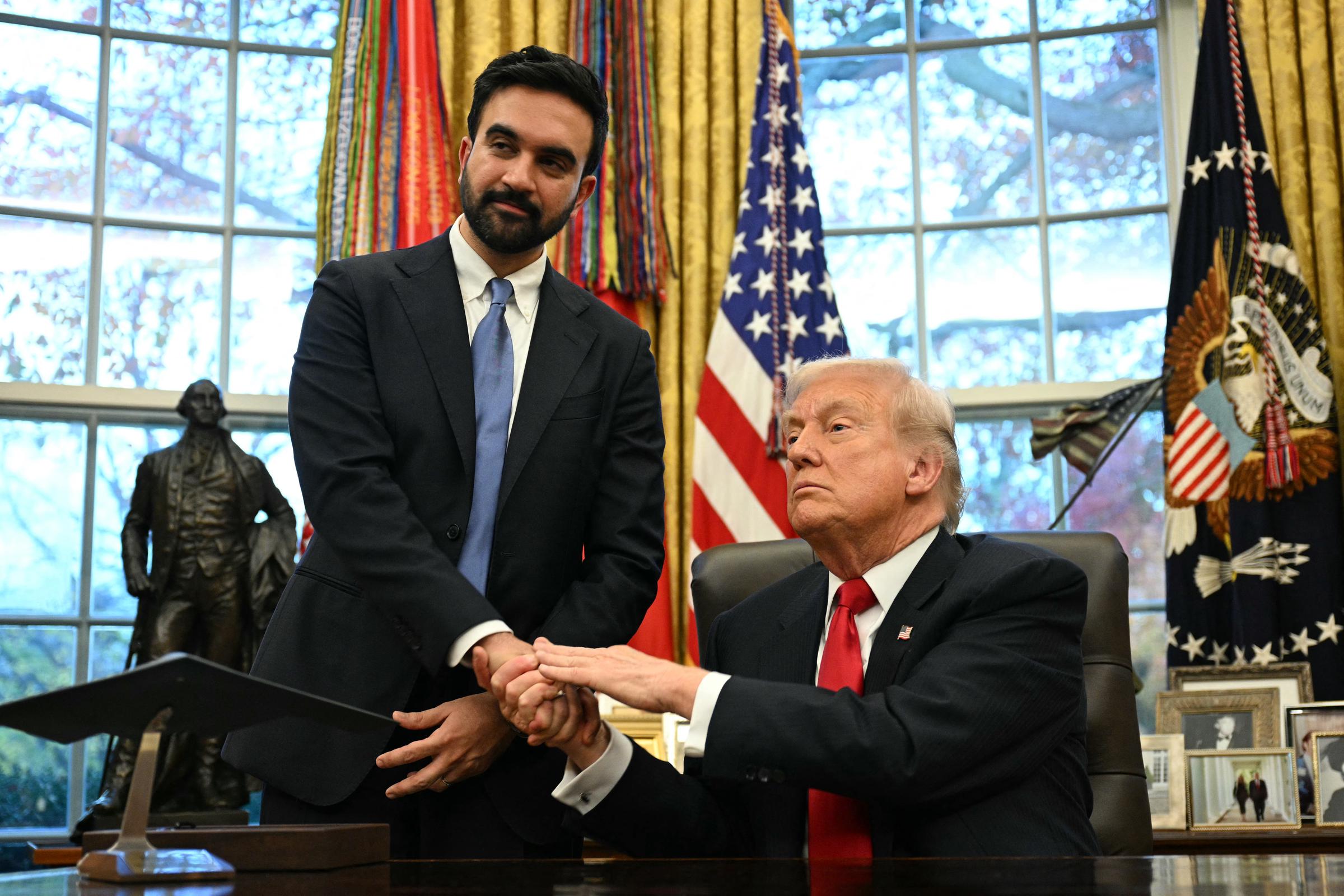 Donald Trump shakes hands with New York City Mayor-elect Zohran Mamdani during a meeting in the Oval Office of the White House on November 21, 2025 | Source: Getty Images