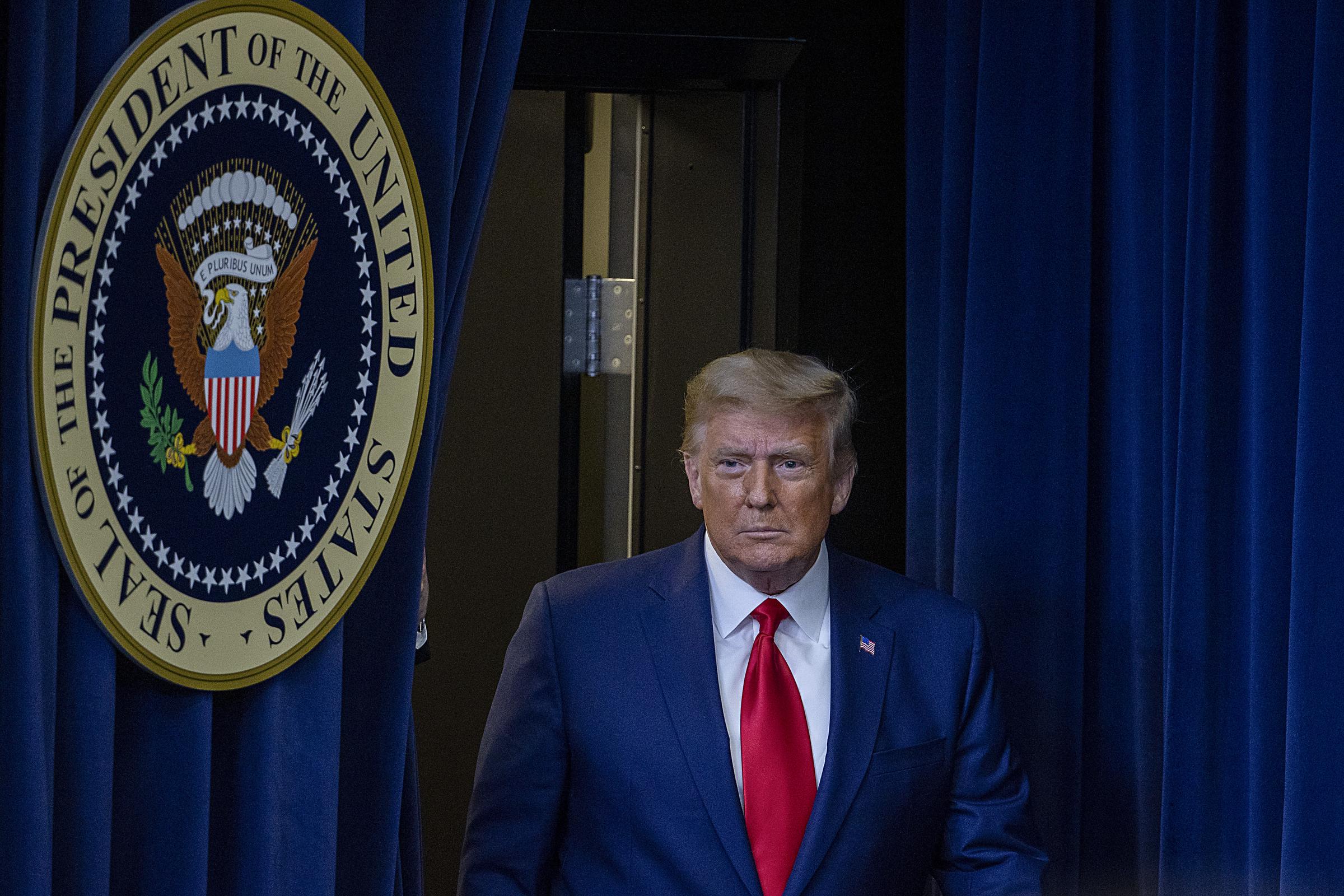 US President Donald Trump arrives to speak at the Operation Warp Speed Vaccine Summit on December 8, 2020, in Washington, DC. | Source: Getty Images
