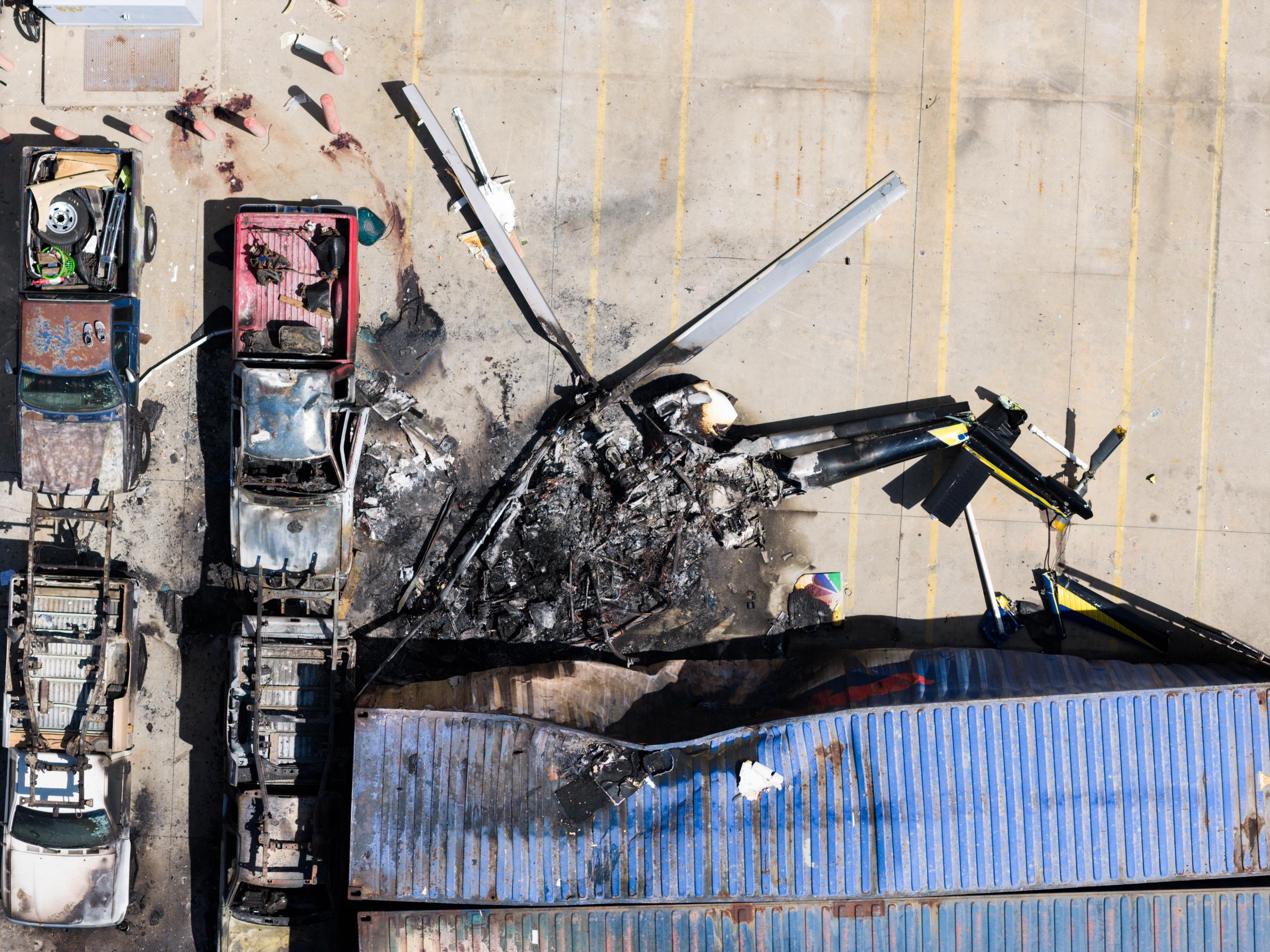 The fire damaged 4 vehicles and 2 storage containers, but officials said it was quickly extinguished. 2 other people near the scene were taken to hospitals. | Source: Getty Images