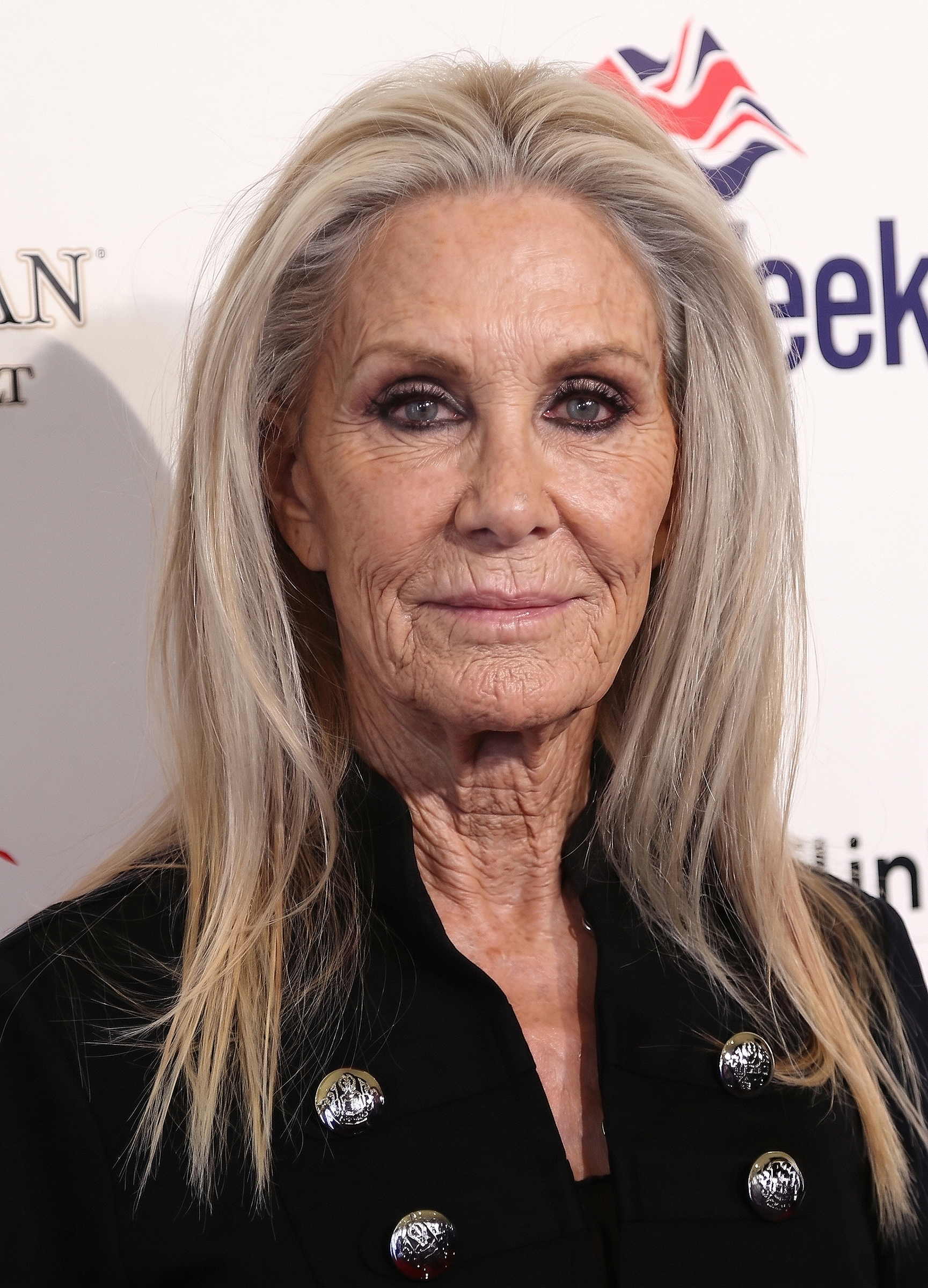 AI presents Joan Van Ark in a refined close-up, imagining how the actress might have appeared with naturally aging features while preserving her unmistakable gaze, polished style, and poised presence on the red carpet. | Source: Gemini