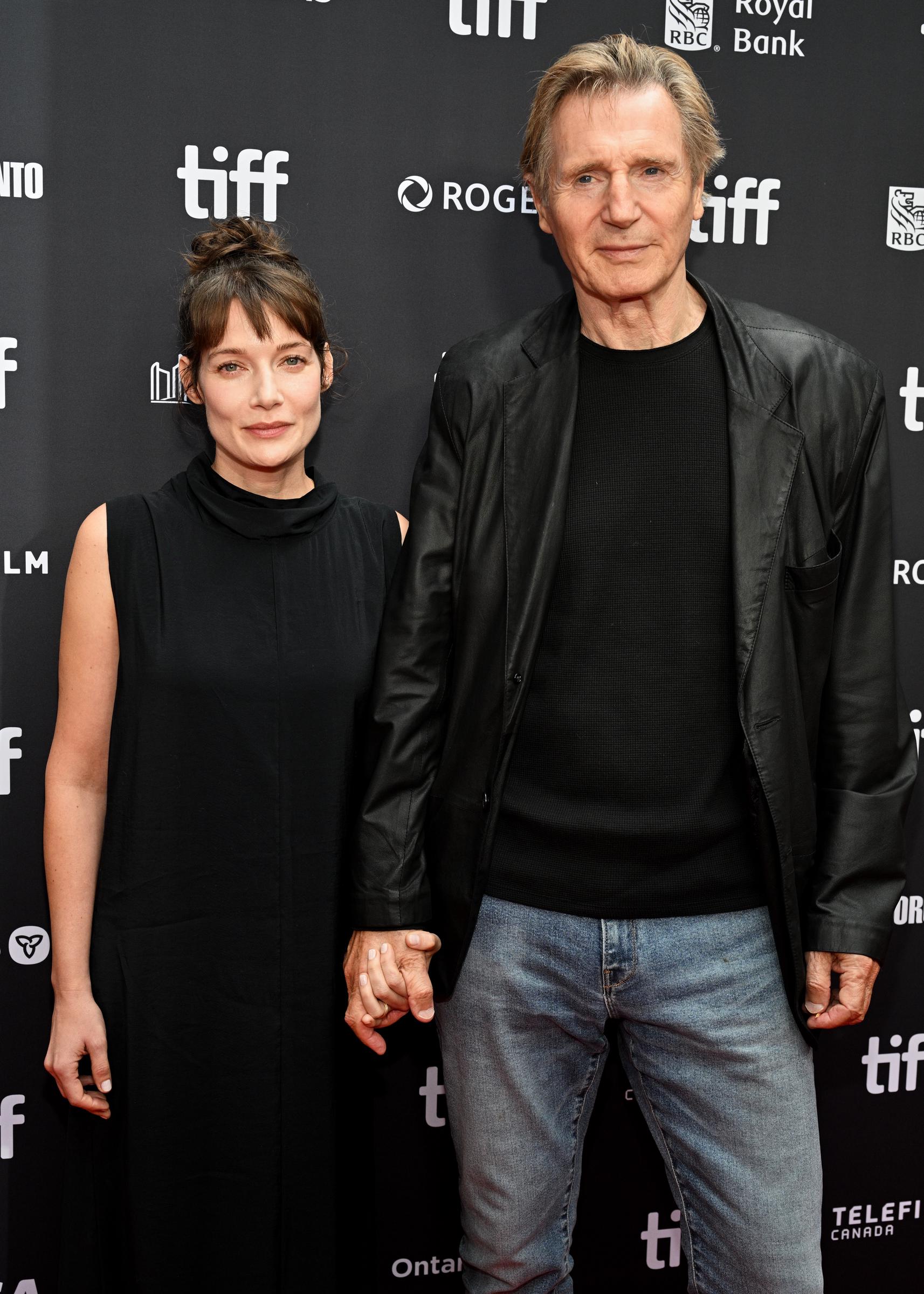 Stella Stocker and Liam Neeson attend the premiere of "Evil Genius" during the Toronto International Film Festival at Roy Thomson Hall on September 12, 2026 in Toronto, Ontario. | Source: Getty Images