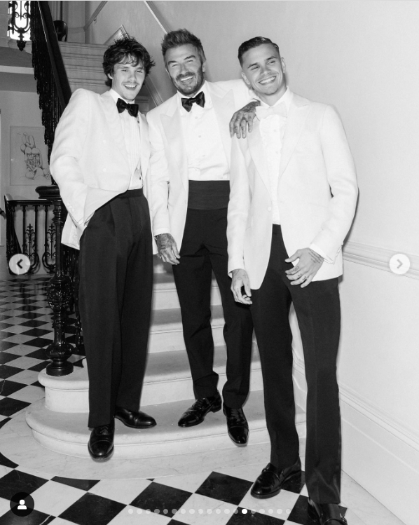 Cruz, David, and Romeo Beckham pose for a photo shared on May 5, 2025. | Source: Instagram/victoriabeckham