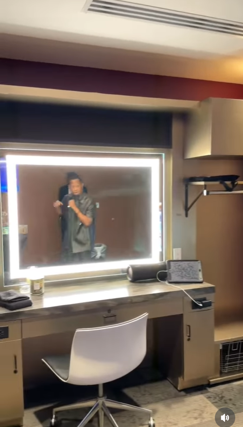 In the second frame, he steps away from the mirror into the room, mid-groove, adjusting his shirt as he dances with relaxed, energetic movements. | Source: Instagram/martinlawrence