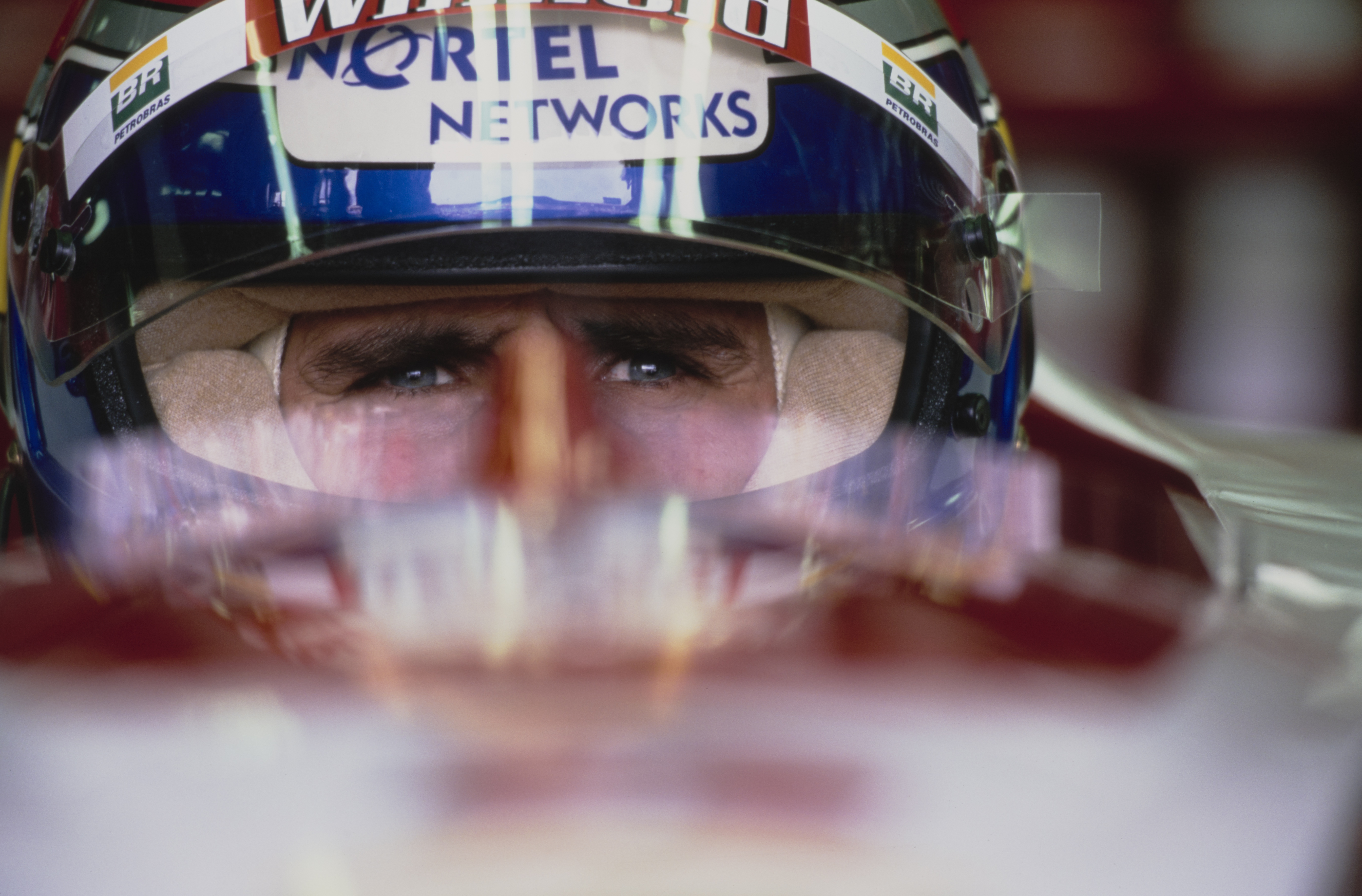 Alex Zanardi looks out from the cockpit during practice for the Formula One Australian Grand Prix at the Melbourne Grand Prix Circuit in Albert Park, Australia, on March 7, 1999. | Source: Getty Images