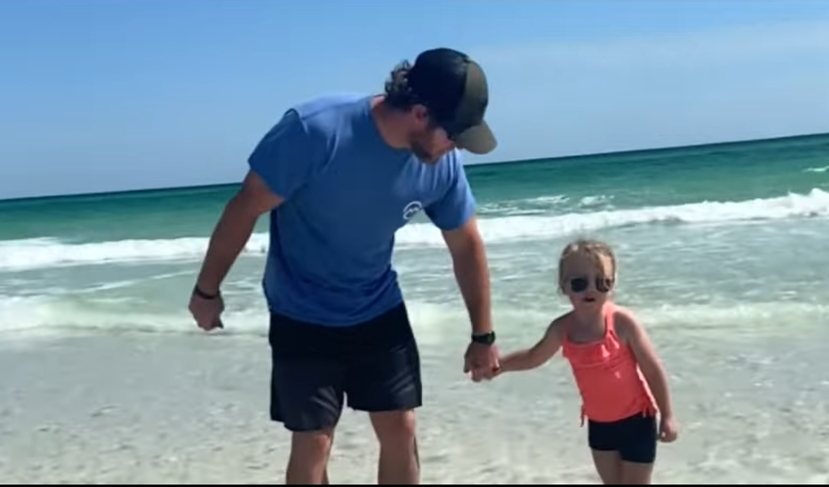 A home video showing Spencer Loalbo playing with one of his daughters, dated June 20, 2025 | Source: YouTube/kvuenews