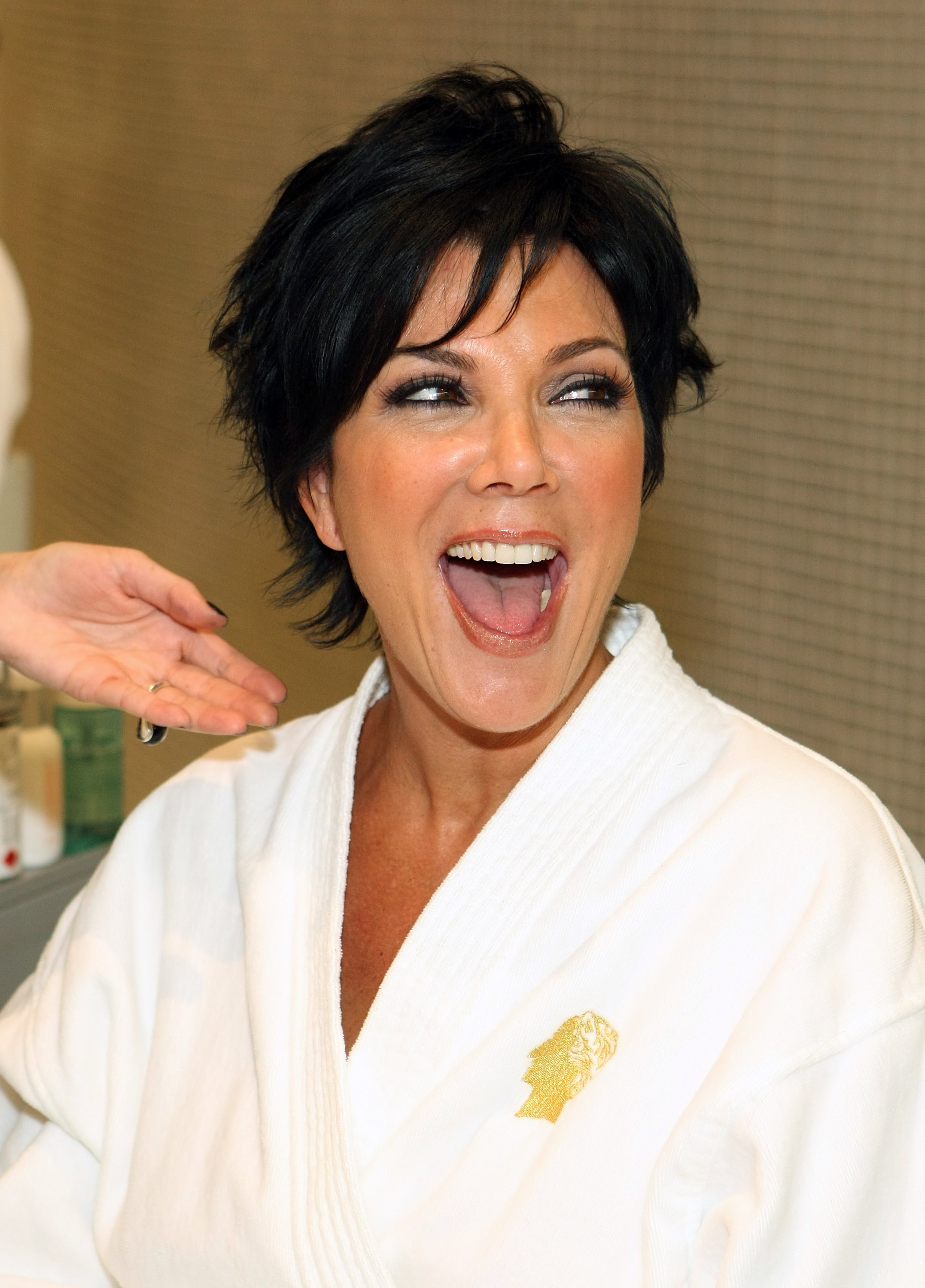 Kris Jenner laughs while having her makeup done at Color salon inside Caesars Palace in Las Vegas, as the Kardashian family films an episode of Keeping Up With the Kardashians. | Source: Getty Images