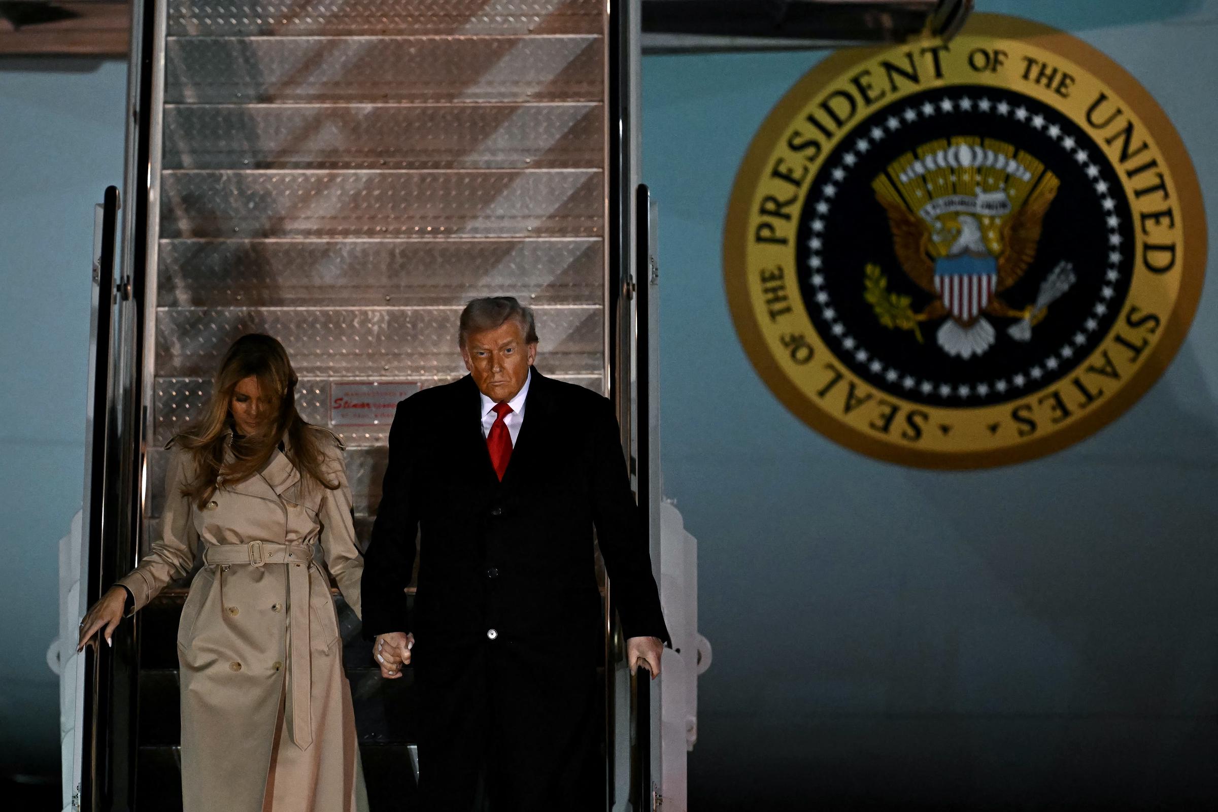 US President Donald Trump and First Lady Melania Trump disembark from Air Force One after landing at Stansted Airport, eastern England, on September 16, 2025, on the first day of a two-day visit to the UK | Source: Getty Images