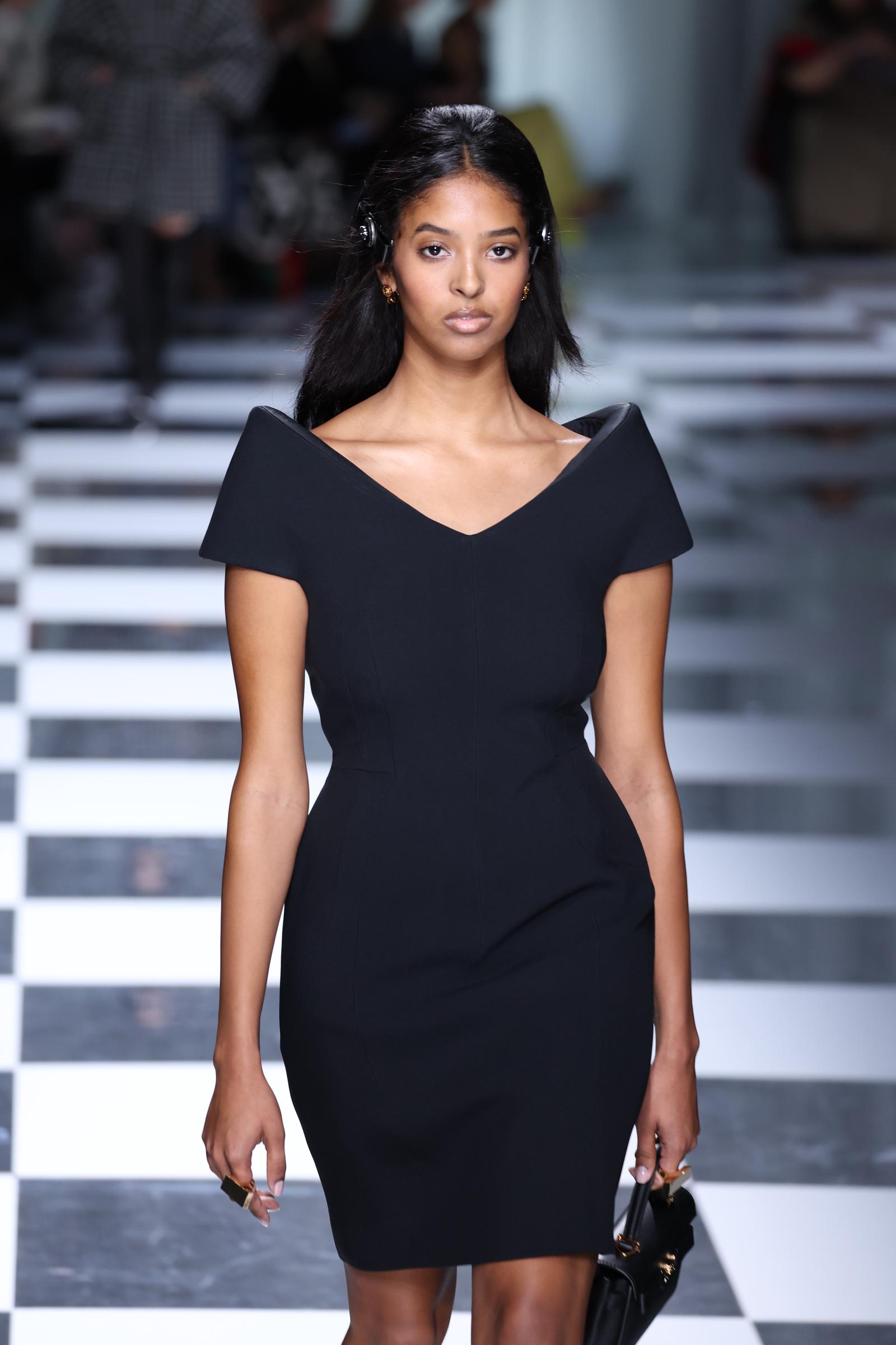Natalia shared her Milan debut with established models including Gigi Hadid and Claudia Schiffer, making her first major runway experience particularly memorable. | Source: Getty Images