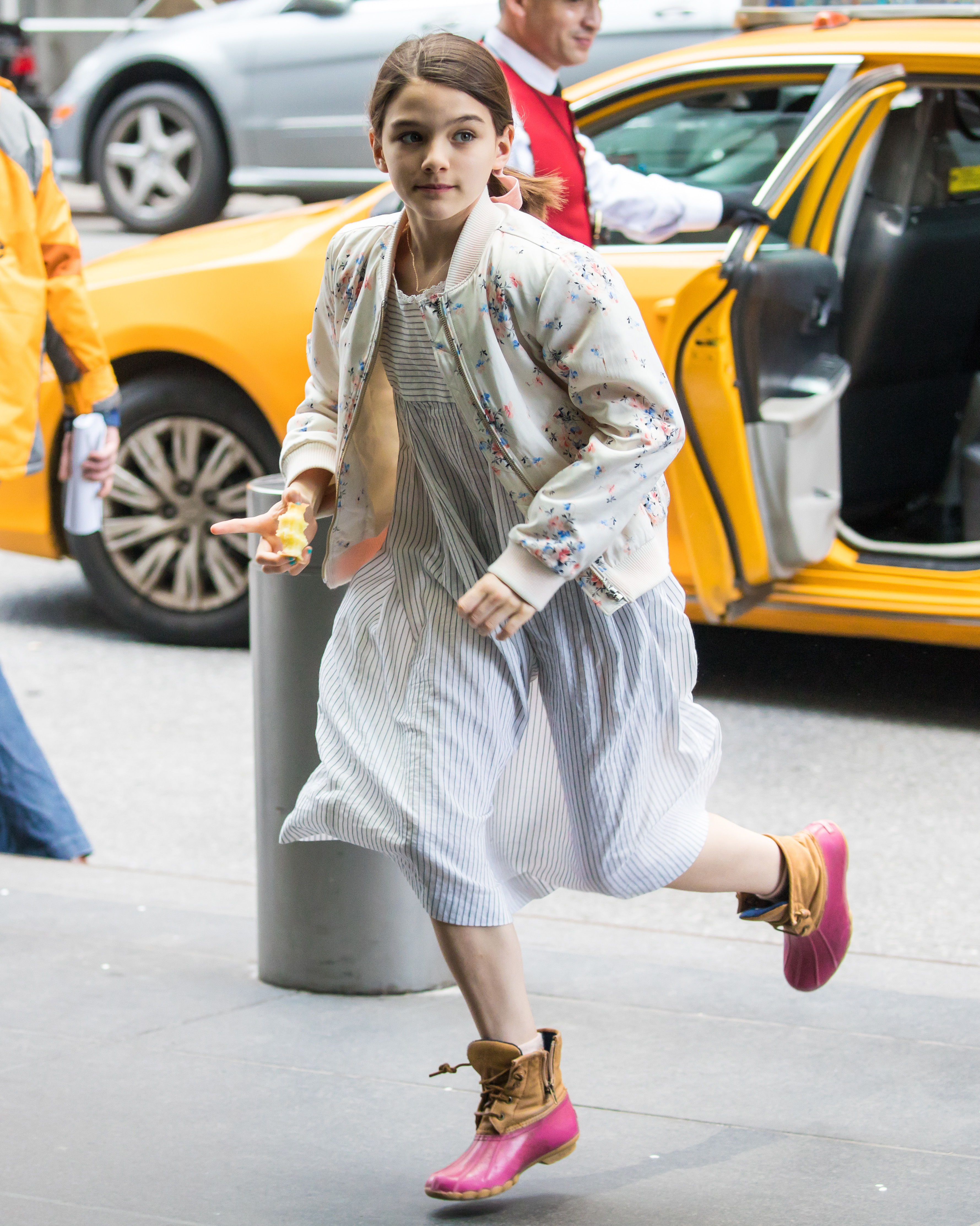 Following Katie Holmes and Tom Cruise's split, Suri largely grew up out of the spotlight while living with her mother in New York City. | Source: Getty Images
