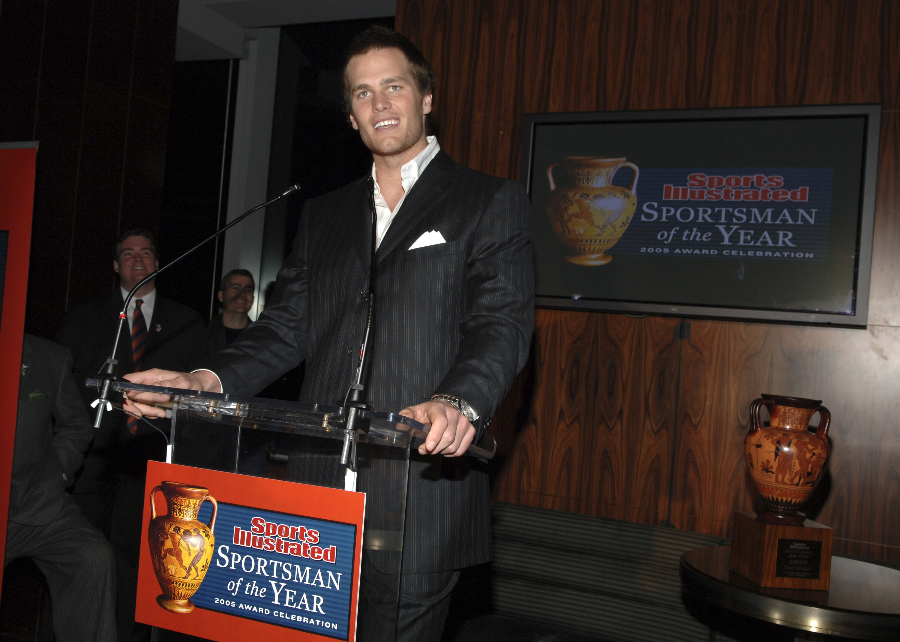 Tom Brady accepted Sports Illustrated's Sportsman of the Year award on December 6, 2005, during the magazine's annual celebration. Captured early in his NFL career, the image showed the quarterback with the facial features that would later become the focus of widespread speculation about his remarkably youthful appearance and changing look.