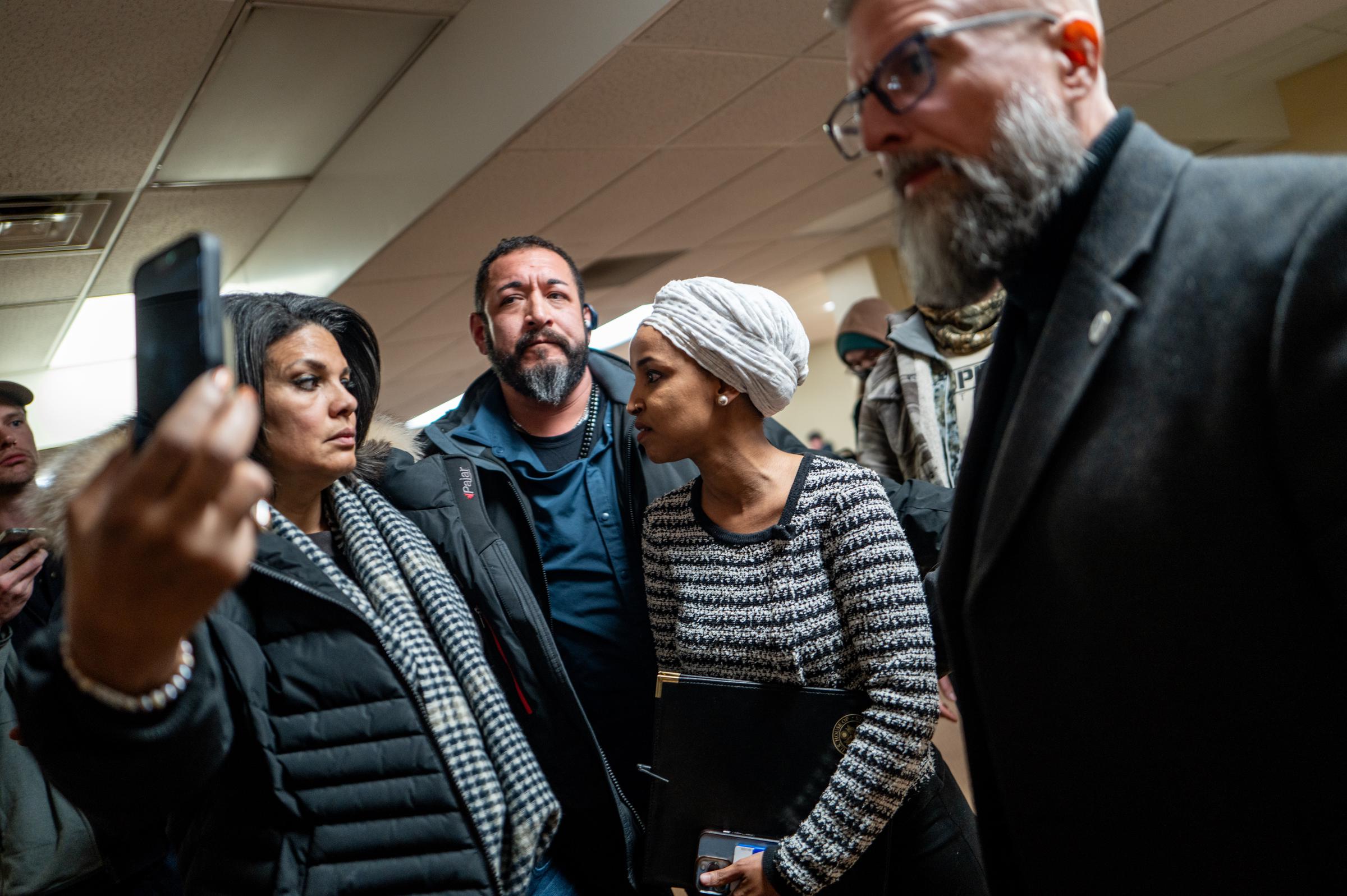 Ilhan Omar speaks to a member of the media at the conclusion of the meeting on January 27, 2026 | Source: Getty Images