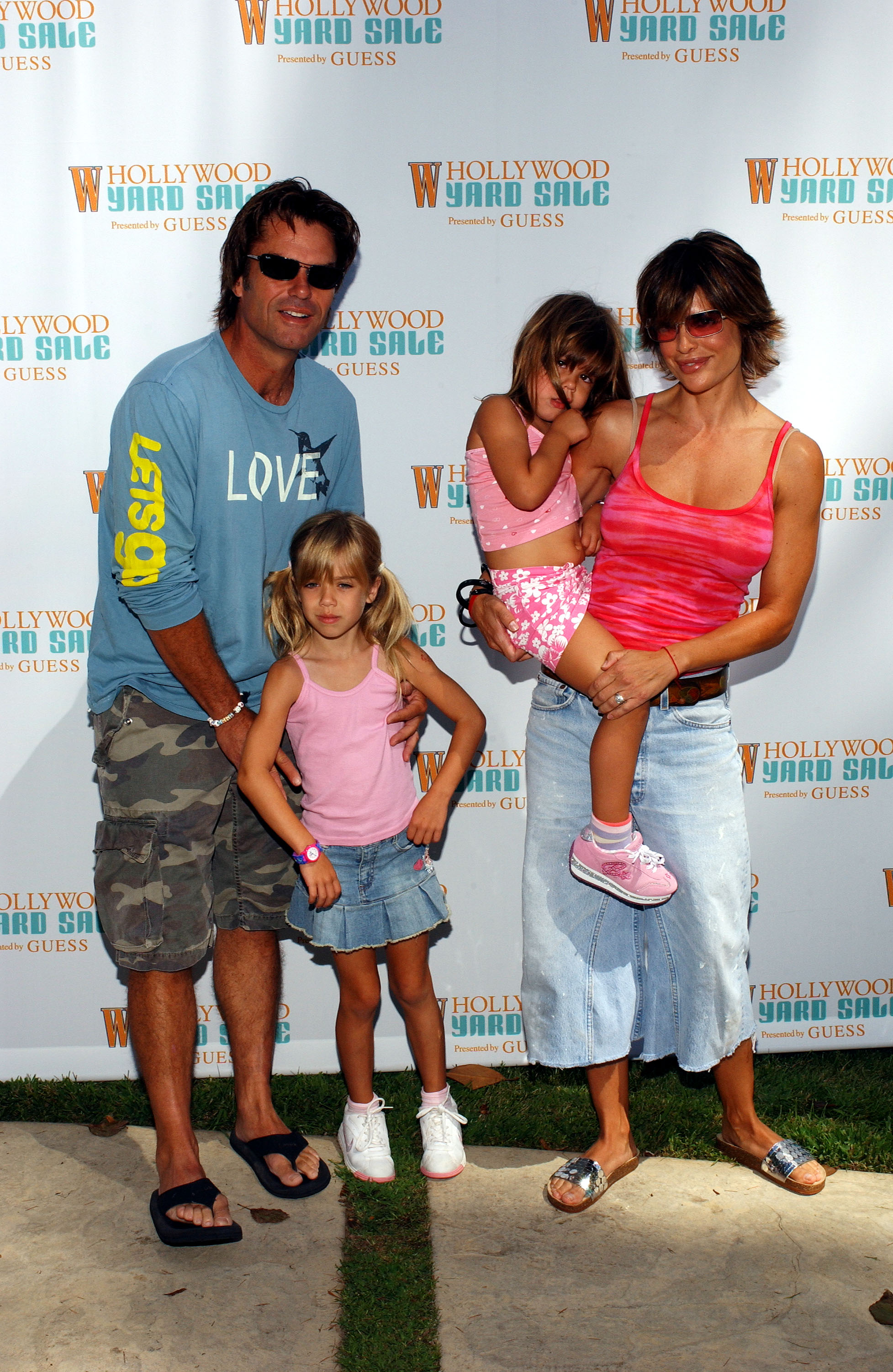 Delilah and Amelia, with their parents, attend the W Hollywood Yard Sale Preview Brunch on September 12, 2004 at a private residence in Los Angeles, California. | Source: Getty Images